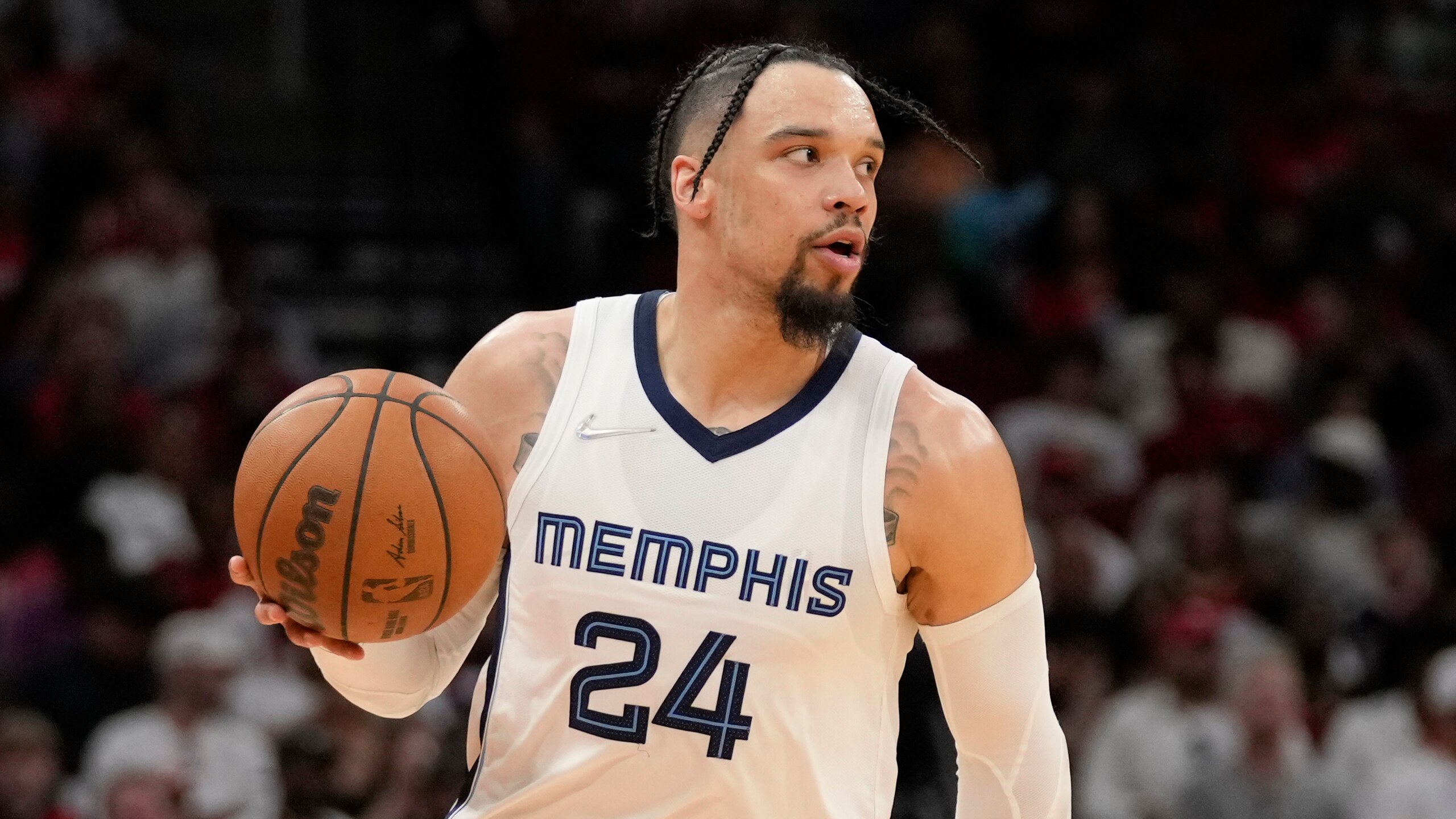 Memphis Grizzlies forward Dillon Brooks dribbles during the second half of an NBA basketball game against the Houston Rockets, Sunday, March 20, 2022, in Houston. (AP Photo/Eric Christian Smith)