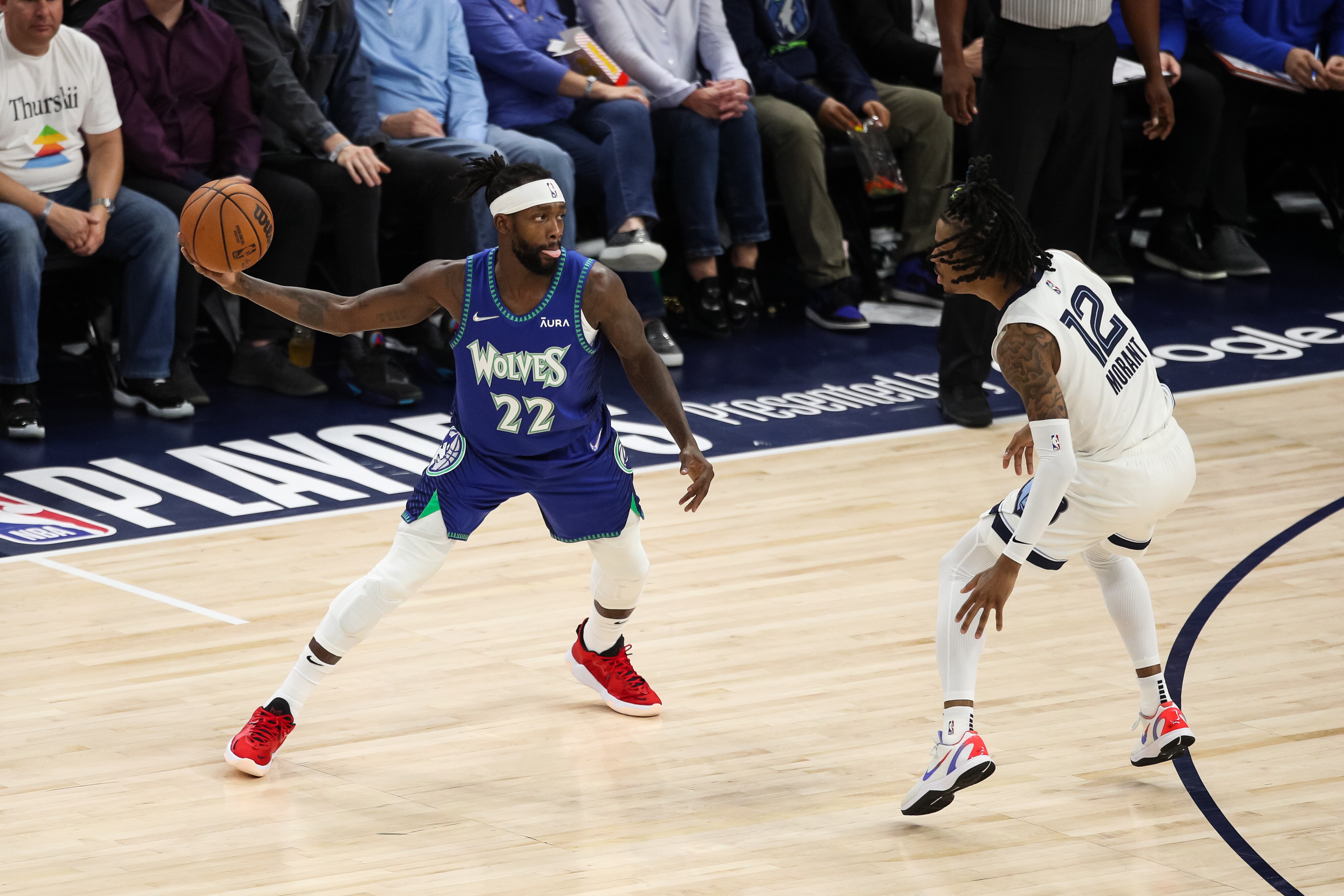 MINNEAPOLIS, MN - APRIL 29: Patrick Beverley #22 of the Minnesota Timberwolves receives a pass while Ja Morant #12 of the Memphis Grizzlies defends in the third quarter of the game during Game Six of the Western Conference First Round at Target Center on April 29, 2022 in Minneapolis, Minnesota. The Grizzlies defeated the Timberwolves 114-106 to advance to the Western Conference Semifinals. NOTE TO USER: User expressly acknowledges and agrees that, by downloading and or using this Photograph, user is consenting to the terms and conditions of the Getty Images License Agreement. (Photo by David Berding/Getty Images)