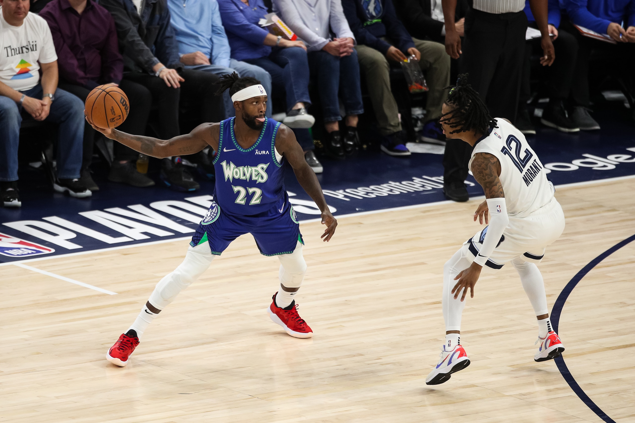 MINNEAPOLIS, MN - APRIL 29: Patrick Beverley #22 of the Minnesota Timberwolves receives a pass while Ja Morant #12 of the Memphis Grizzlies defends in the third quarter of the game during Game Six of the Western Conference First Round at Target Center on April 29, 2022 in Minneapolis, Minnesota. The Grizzlies defeated the Timberwolves 114-106 to advance to the Western Conference Semifinals. NOTE TO USER: User expressly acknowledges and agrees that, by downloading and or using this Photograph, user is consenting to the terms and conditions of the Getty Images License Agreement. (Photo by David Berding/Getty Images)