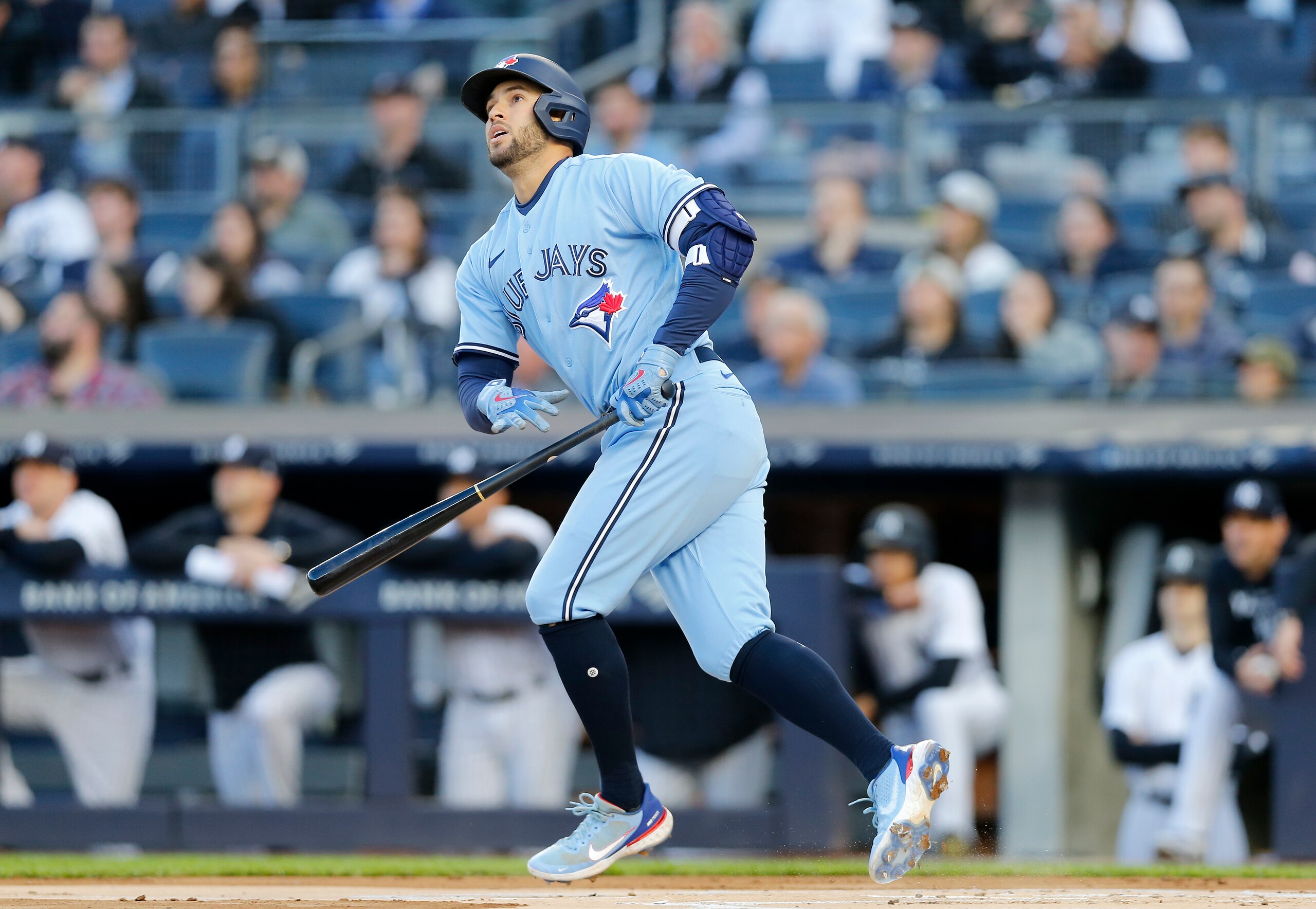 NEW YORK, NEW YORK - MAY 10:  George Springer #4 of the Toronto Blue Jays follows through on a first inning home run  against the New York Yankees at Yankee Stadium on May 10, 2022 in New York City. The Yankees defeated the Blue Jays 6-5. (Photo by Jim McIsaac/Getty Images)