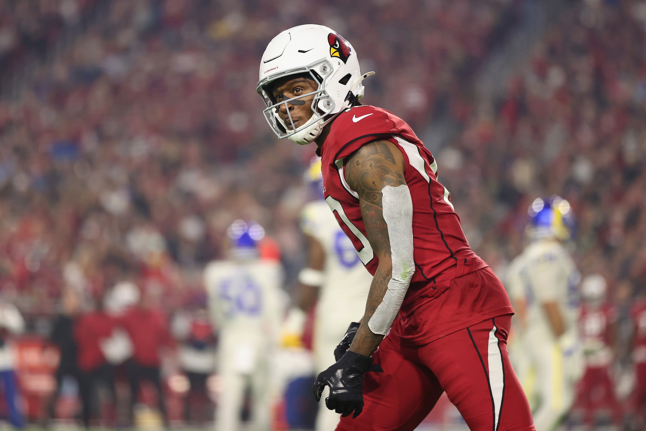 GLENDALE, ARIZONA - DECEMBER 13: Wide receiver DeAndre Hopkins #10 of the Arizona Cardinals lines up during the NFL game against the Los Angeles Rams at State Farm Stadium on December 13, 2021 in Glendale, Arizona. The Rams defeated the Cardinals 30-23. (Photo by Christian Petersen/Getty Images) GLENDALE, ARIZONA - DECEMBER 13: Wide receiver DeAndre Hopkins #10 of the Arizona Cardinals lines up during the NFL game against the Los Angeles Rams at State Farm Stadium on December 13, 2021 in Glendale, Arizona. The Rams defeated the Cardinals 30-23. (Photo by Christian Petersen/Getty Images)