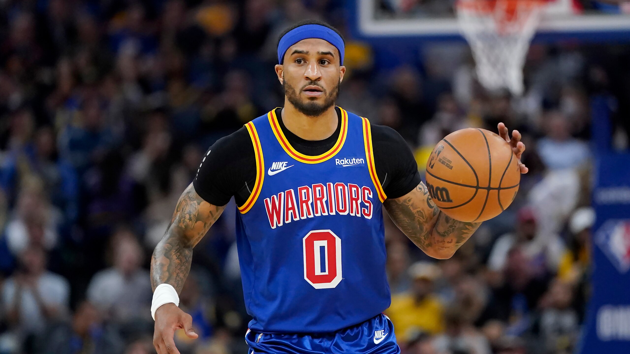 Golden State Warriors guard Gary Payton II (0) against the Los Angeles Lakers during an NBA basketball game in San Francisco, Thursday, April 7, 2022. (AP Photo/Jeff Chiu)