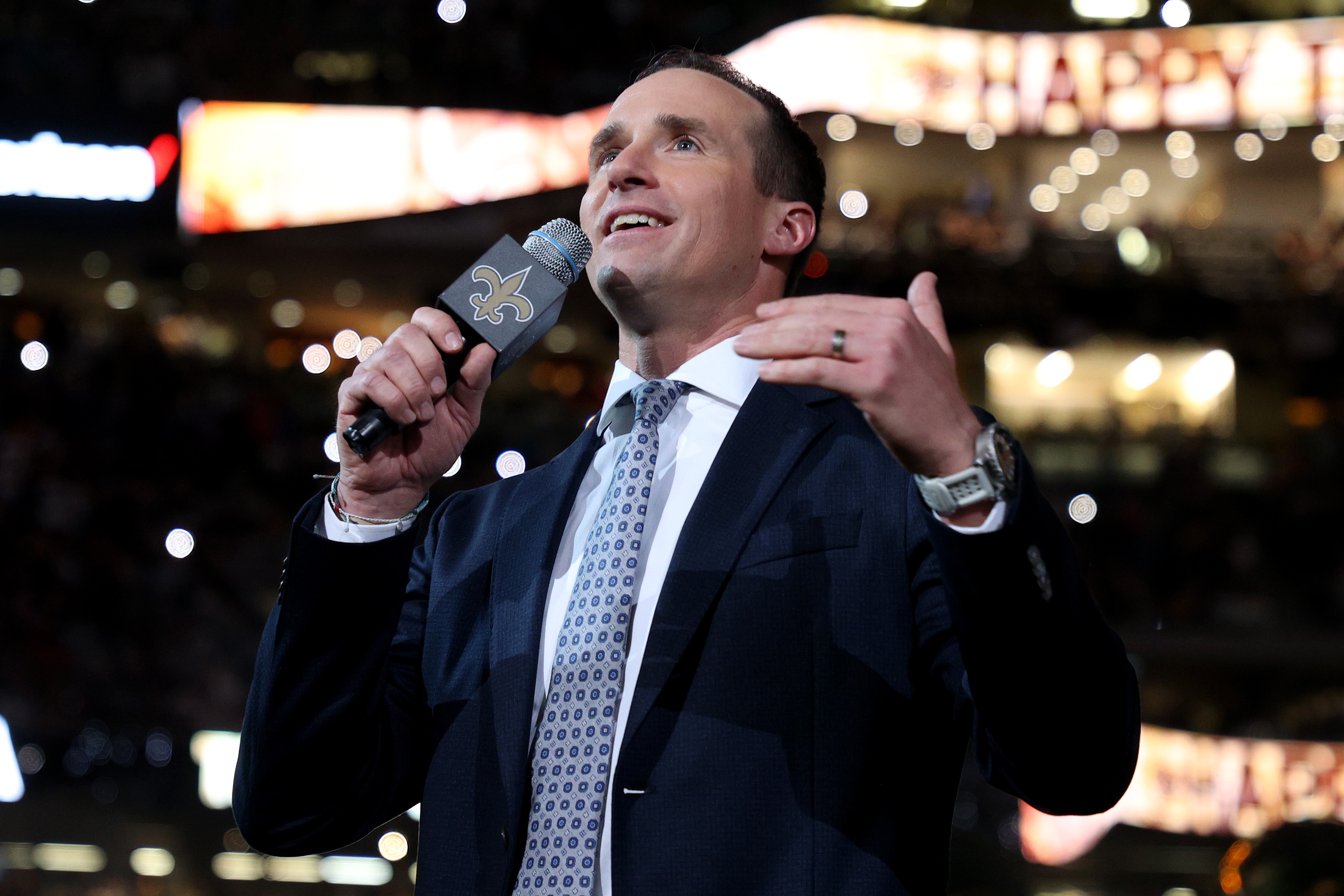 NEW ORLEANS, LOUISIANA - NOVEMBER 25: Former New Orleans Saints quarterback Drew Brees speaks to the fans during halftime of the game between the Buffalo Bills and the New Orleans Saints at Caesars Superdome on November 25, 2021 in New Orleans, Louisiana. (Photo by Chris Graythen/Getty Images)