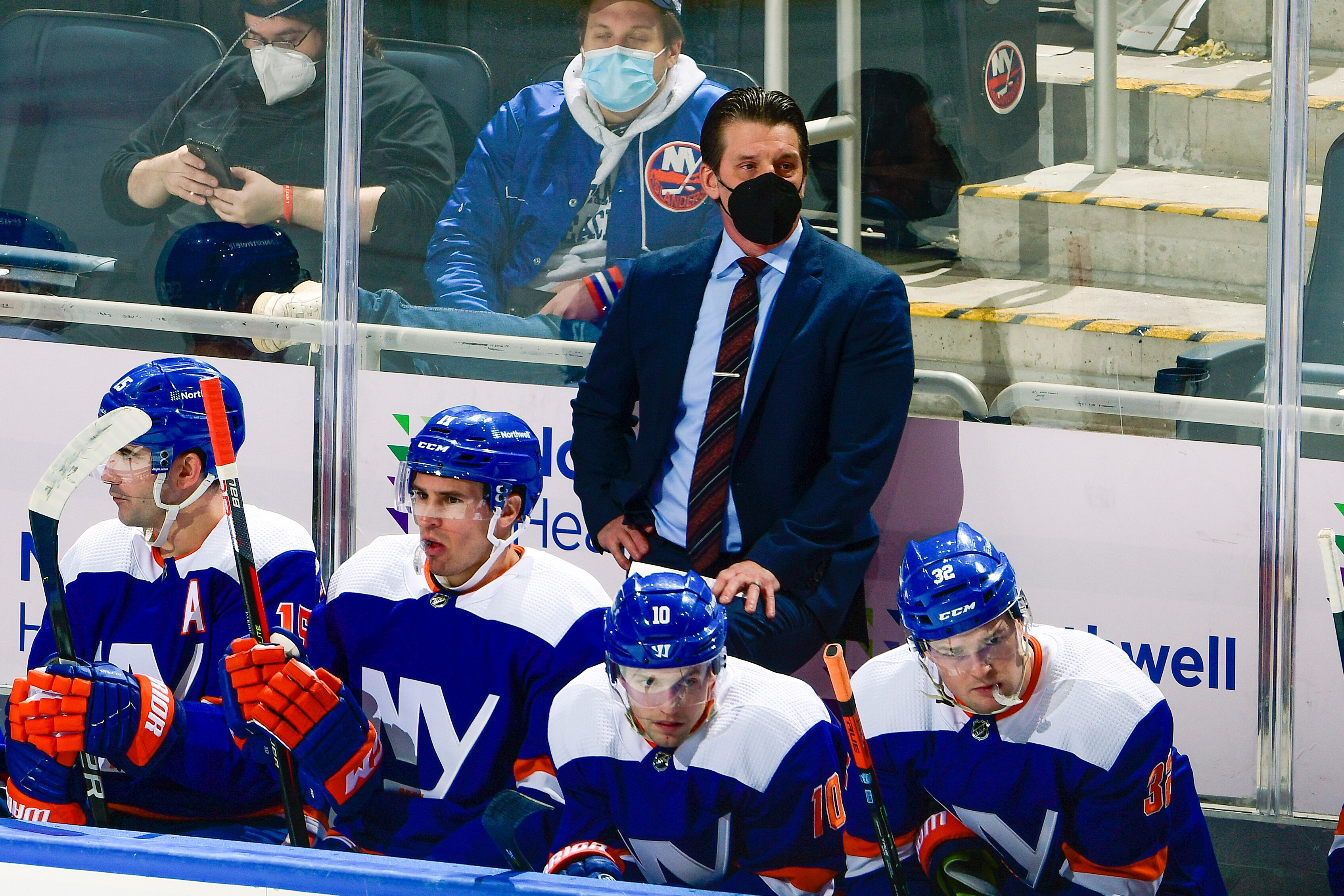 ELMONT, NEW YORK - JANUARY 01:  Interim head coach Lane Lambert of the New York Islanders looks on against the Edmonton Oilers during the first period at UBS Arena on January 01, 2022 in Elmont, New York. Head coach Barry Trotz is not on the bench today due to personal reasons. (Photo by Steven Ryan/Getty Images)