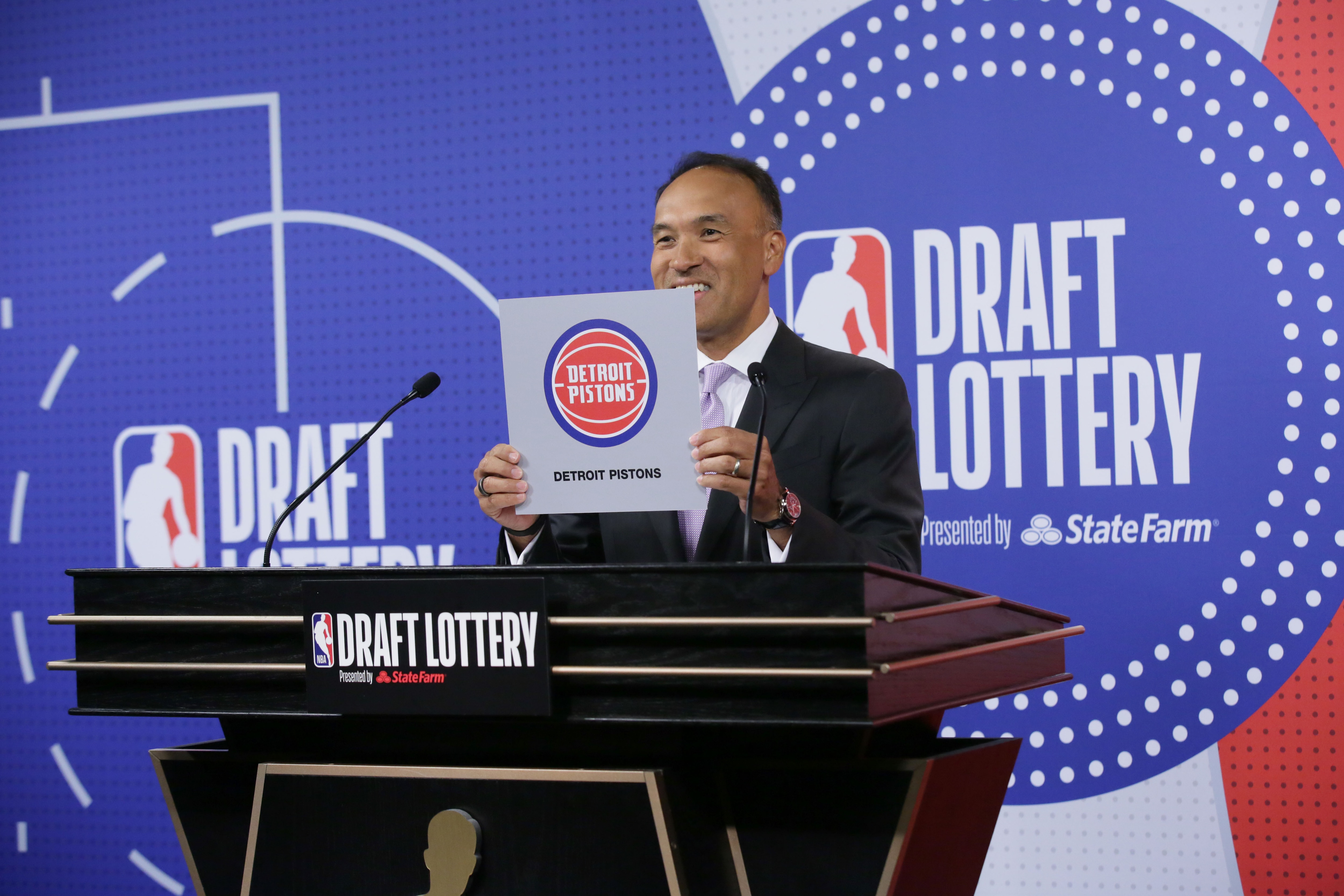 SECAUCUS, NJ - JUNE 22: Deputy Commissioner of the NBA, Mark Tatum holds up the card of the Detroit Pistons after they get the 1st overall pick in the NBA Draft during the 2021 NBA Draft Lottery on June 22, 2021 at the NBA Entertainment Studios in Secaucus, New Jersey. NOTE TO USER: User expressly acknowledges and agrees that, by downloading and/or using this photograph, user is consenting to the terms and conditions of the Getty Images License Agreement. Mandatory Copyright Notice: Copyright 2021 NBAE (Photo by Steve Freeman/NBAE via Getty Images)