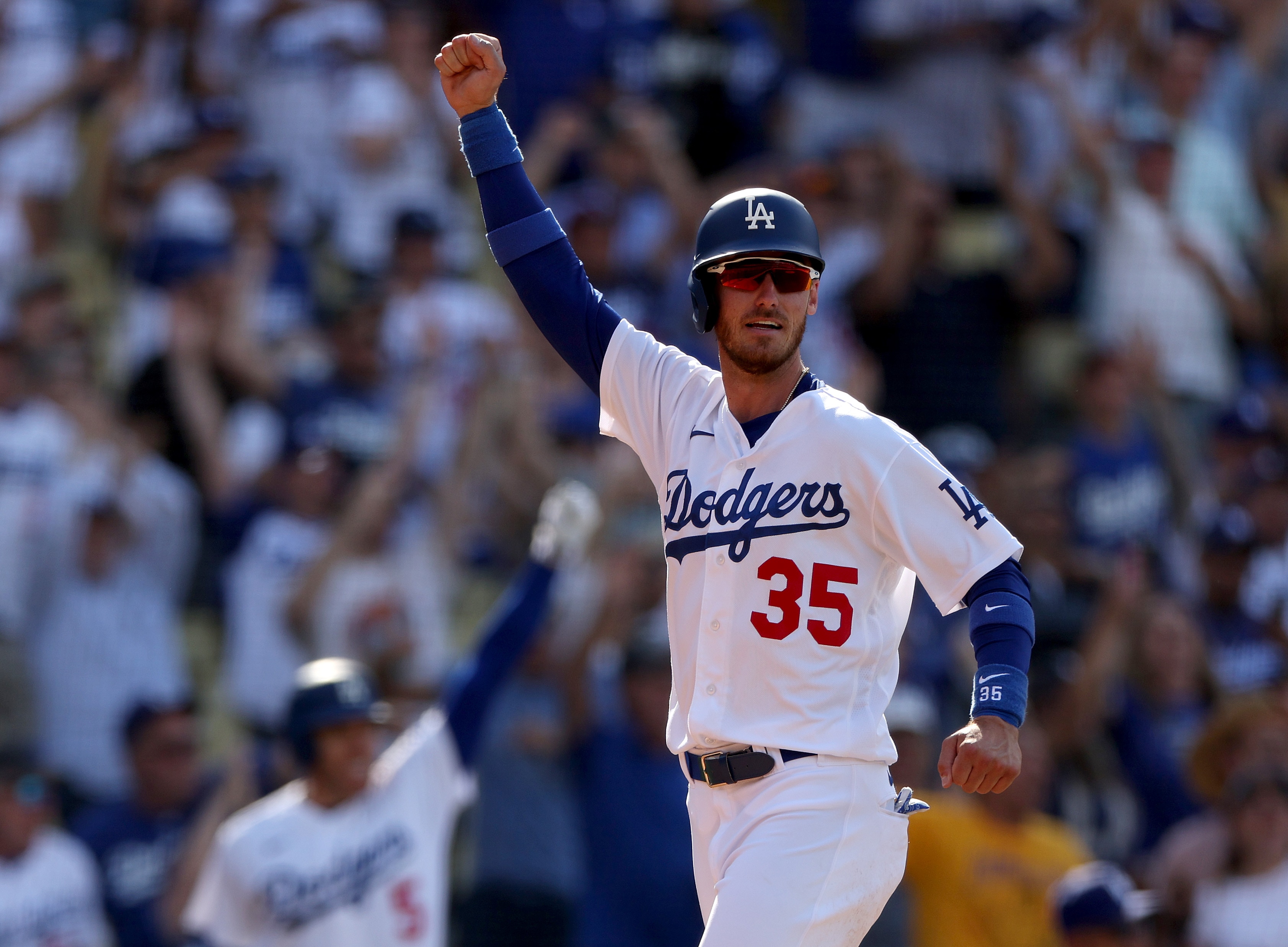 LOS ANGELES, CALIFORNIA - MAY 15: Cody Bellinger #35 of the Los Angeles Dodgers celebrates his run from a Gavin Lux #9 walk off double for a 5-4 win over the Philadelphia Phillies during the bottom of the ninth inning at Dodger Stadium on May 15, 2022 in Los Angeles, California. (Photo by Harry How/Getty Images)
