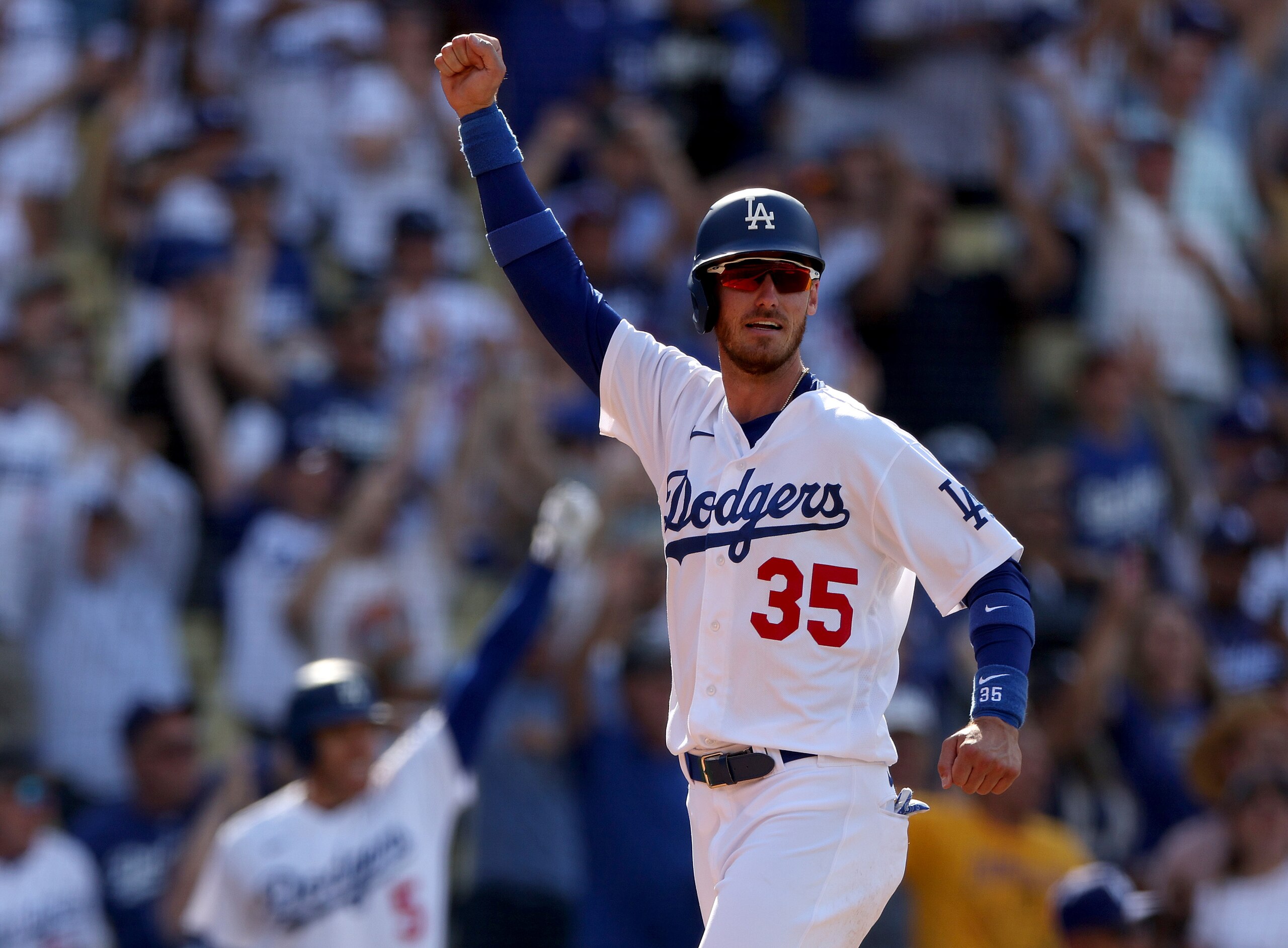 LOS ANGELES, CALIFORNIA - MAY 15: Cody Bellinger #35 of the Los Angeles Dodgers celebrates his run from a Gavin Lux #9 walk off double for a 5-4 win over the Philadelphia Phillies during the bottom of the ninth inning at Dodger Stadium on May 15, 2022 in Los Angeles, California. (Photo by Harry How/Getty Images)