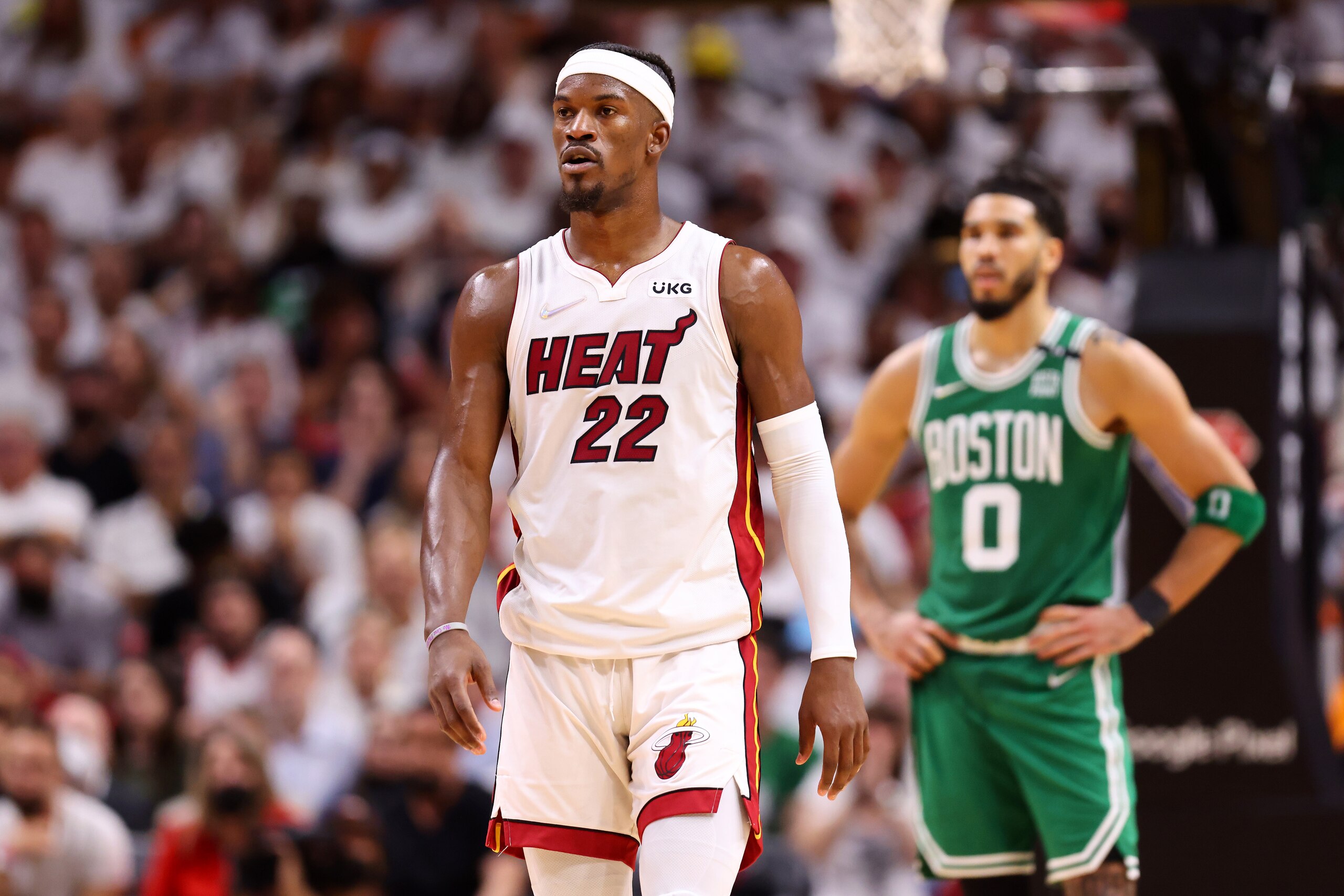 MIAMI, FLORIDA - MAY 17: Jimmy Butler #22 of the Miami Heat looks on ahead of Jayson Tatum #0 of the Boston Celtics during the fourth quarter in Game One of the 2022 NBA Playoffs Eastern Conference Finals at FTX Arena on May 17, 2022 in Miami, Florida. NOTE TO USER: User expressly acknowledges and agrees that, by downloading and or using this photograph, User is consenting to the terms and conditions of the Getty Images License Agreement. (Photo by Michael Reaves/Getty Images) MIAMI, FLORIDA - MAY 17: Jimmy Butler #22 of the Miami Heat looks on ahead of Jayson Tatum #0 of the Boston Celtics during the fourth quarter in Game One of the 2022 NBA Playoffs Eastern Conference Finals at FTX Arena on May 17, 2022 in Miami, Florida. NOTE TO USER: User expressly acknowledges and agrees that, by downloading and or using this photograph, User is consenting to the terms and conditions of the Getty Images License Agreement. (Photo by Michael Reaves/Getty Images)