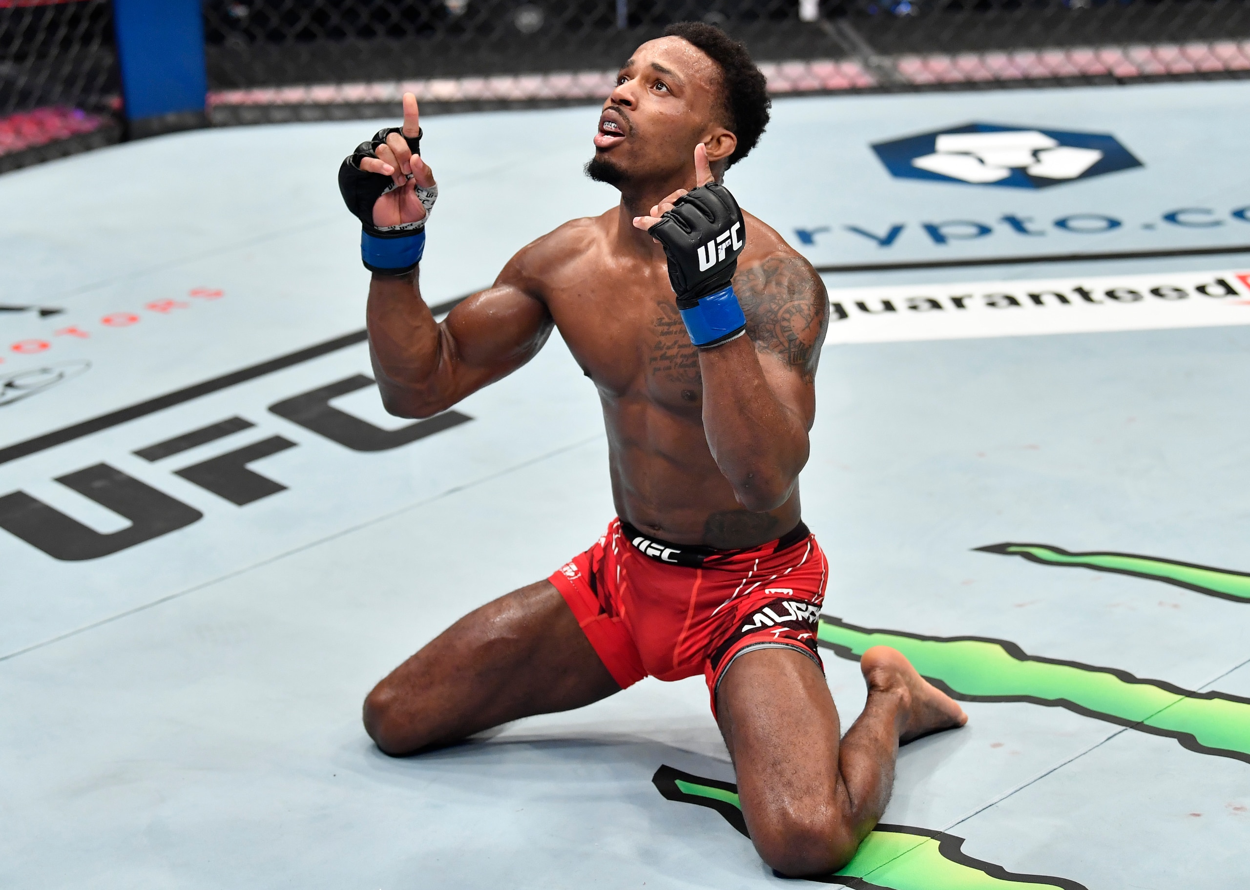 ABU DHABI, UNITED ARAB EMIRATES - OCTOBER 30: Lerone Murphy of England celebrates after his knockout victory over Makwan Amirkhani of Finland in a featherweight fight during the UFC 267 event at Etihad Arena on October 30, 2021 in Yas Island, Abu Dhabi, United Arab Emirates. (Photo by Chris Unger/Zuffa LLC)