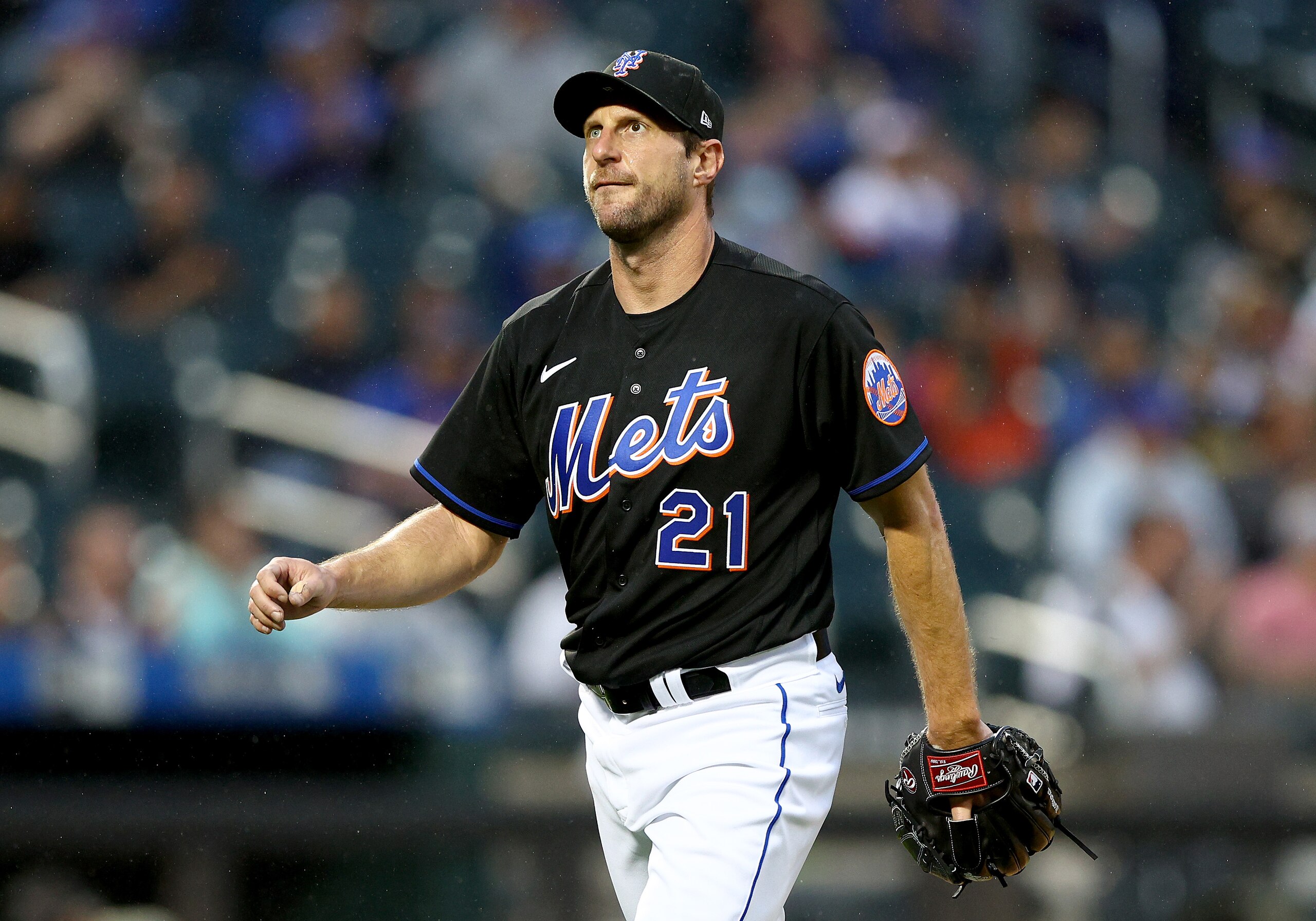 NEW YORK, NEW YORK - MAY 13:  Max Scherzer of the New York Mets reacts after the first inning against the Seattle Mariners at Citi Field on May 13, 2022 in the Flushing neighborhood of the Queens borough of New York City. (Photo by Elsa/Getty Images)