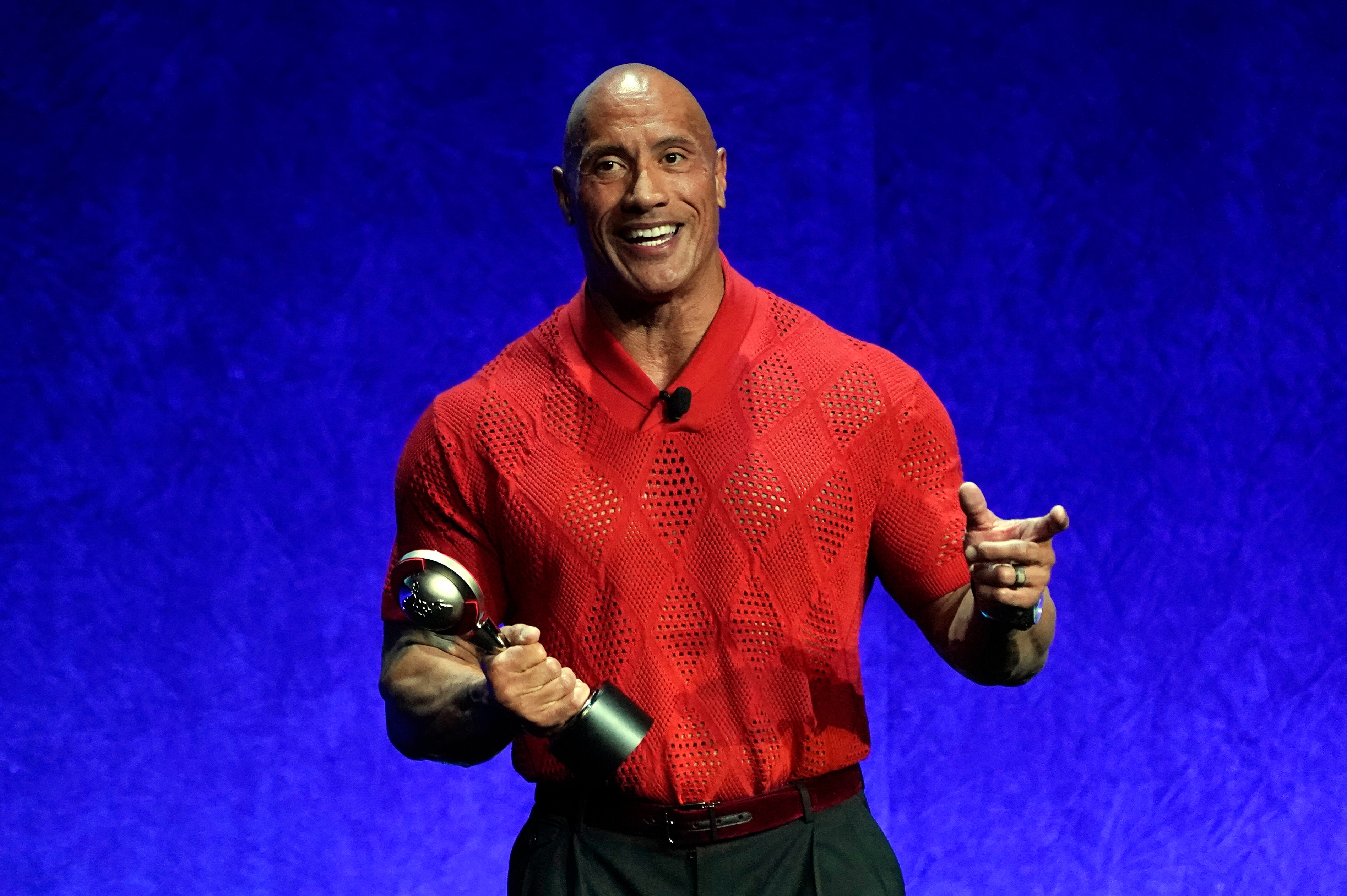 Dwayne Johnson, recipient of the CinemaCon "Entertainment Icon of the Decade" award, addresses the audience during the Warner Bros. Pictures presentation at CinemaCon 2022 at Caesars Palace, Tuesday, April 26, 2022, in Las Vegas. (AP Photo/Chris Pizzello)