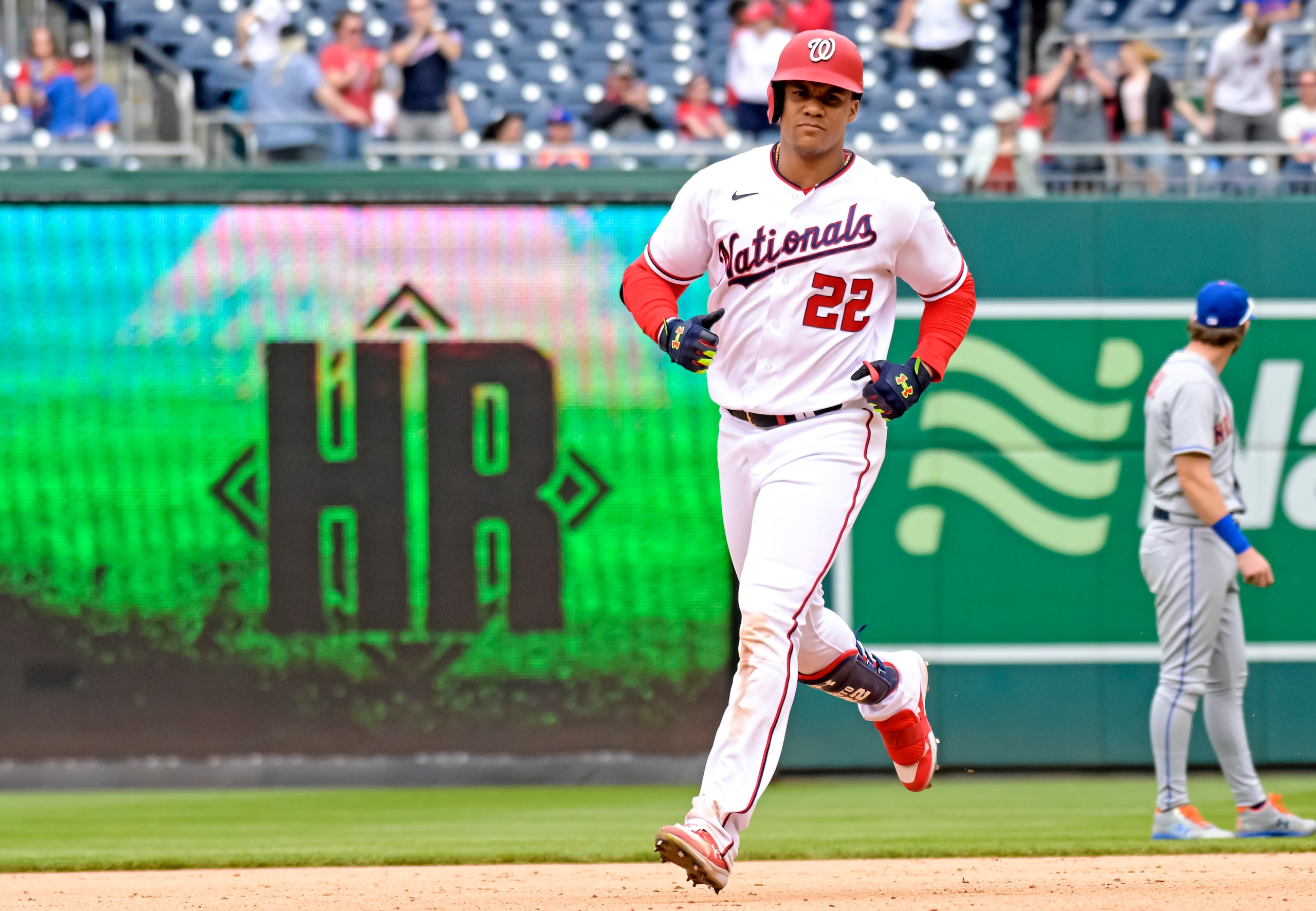 WASHINGTON, DC - May 12: Washington Nationals right fielder Juan Soto (22) circles the bases after hitting a home run during the New York Mets versus the Washington Nationals on May 12, 2022 at Nationals Park in Washington, D.C.  (Photo by Mark Goldman/Icon Sportswire via Getty Images)