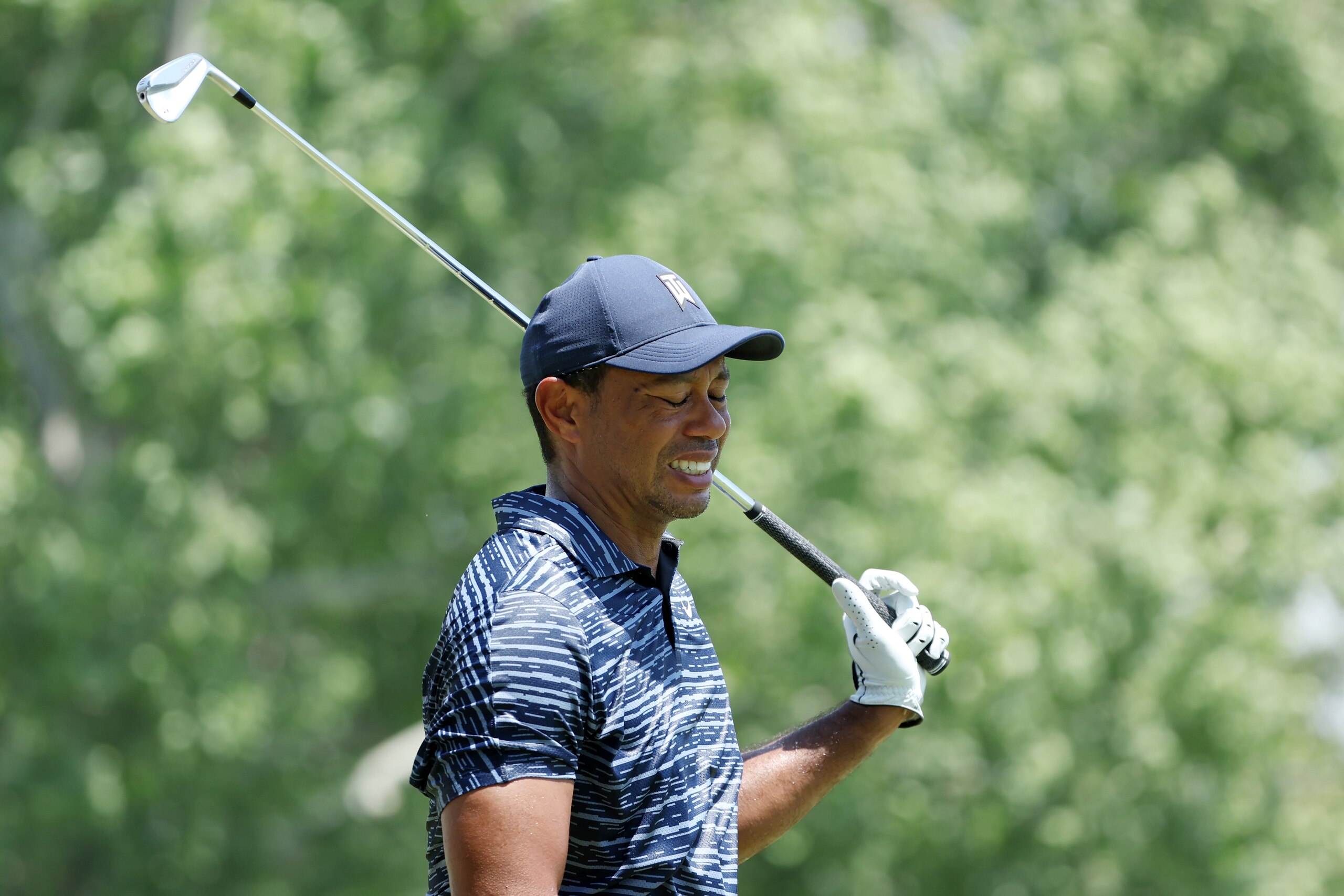 TULSA, OKLAHOMA - MAY 19: Tiger Woods of the United States walks from the eighth hole during the first round of the 2022 PGA Championship at Southern Hills Country Club on May 19, 2022 in Tulsa, Oklahoma. (Photo by Christian Petersen/Getty Images)