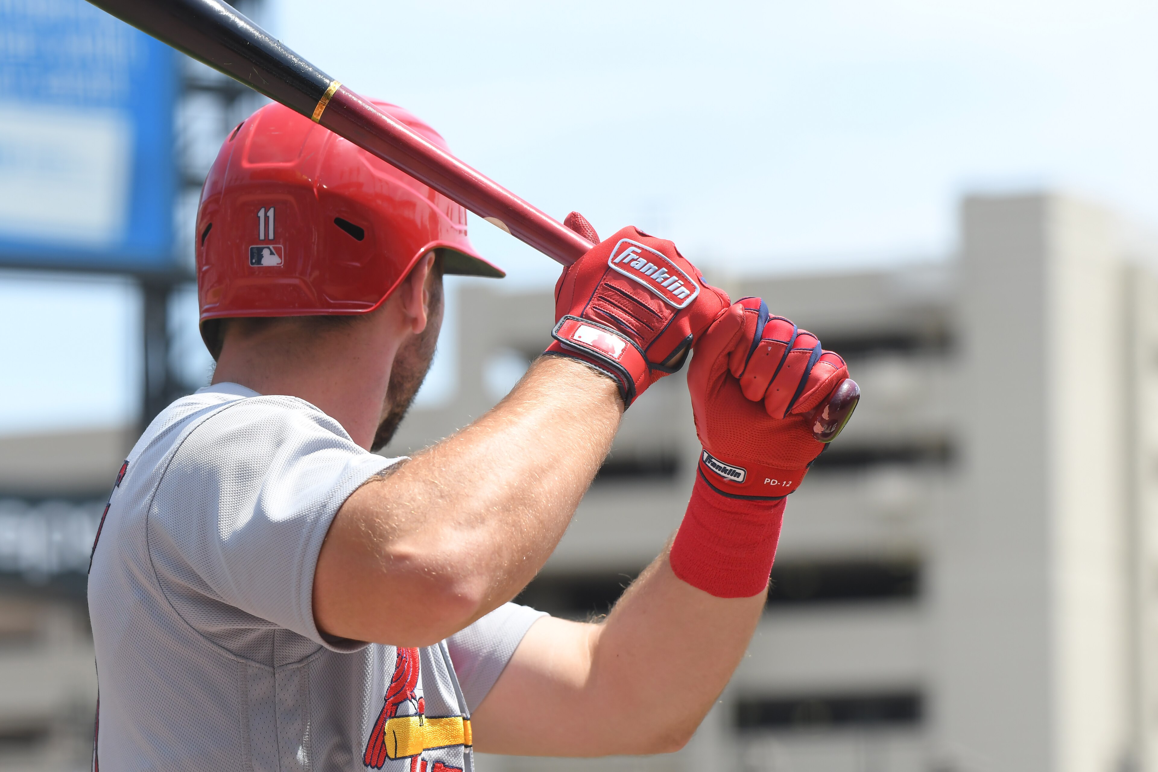 DETROIT, MI - JUNE 23:  A detailed view of the Franklin batting gloves worn by Paul DeJong #11 of the St. Louis Cardinals while he waits on-deck to bat during the game against the Detroit Tigers at Comerica Park on June 23, 2021 in Detroit, Michigan. The Tigers defeated the Cardinals 6-2.  (Photo by Mark Cunningham/MLB Photos via Getty Images)