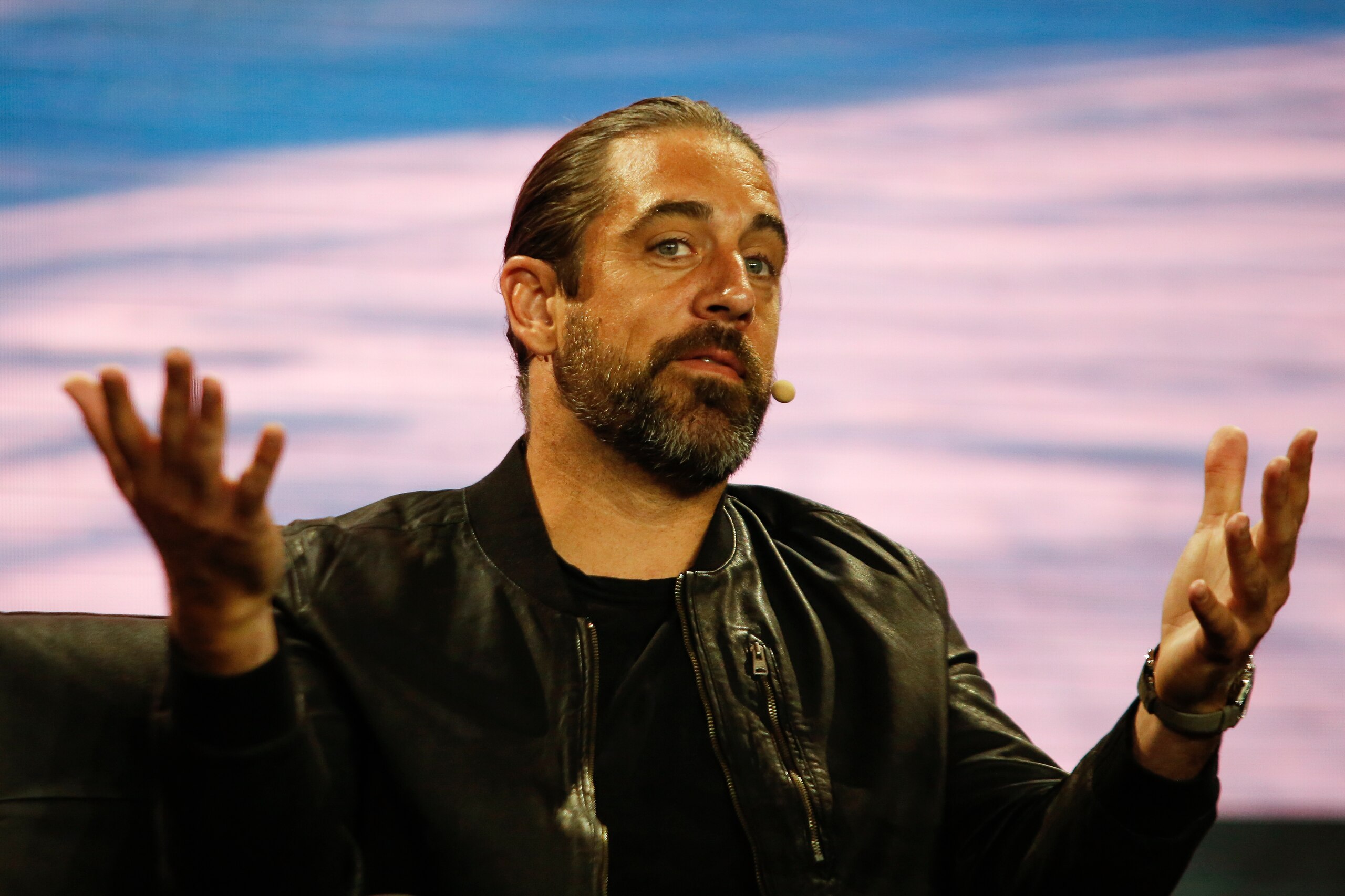 MIAMI, FLORIDA - APRIL 7: Aaron Rodgers, professional football player, and investor, speaks during the Bitcoin 2022 Conference at the Miami Beach Convention Center on April 7, 2022 in Miami, Florida. The worlds largest bitcoin conference runs from April 6-9, expecting over 30,000 people in attendance and over 7 million live stream viewers worldwide.(Photo by Marco Bello/Getty Images)