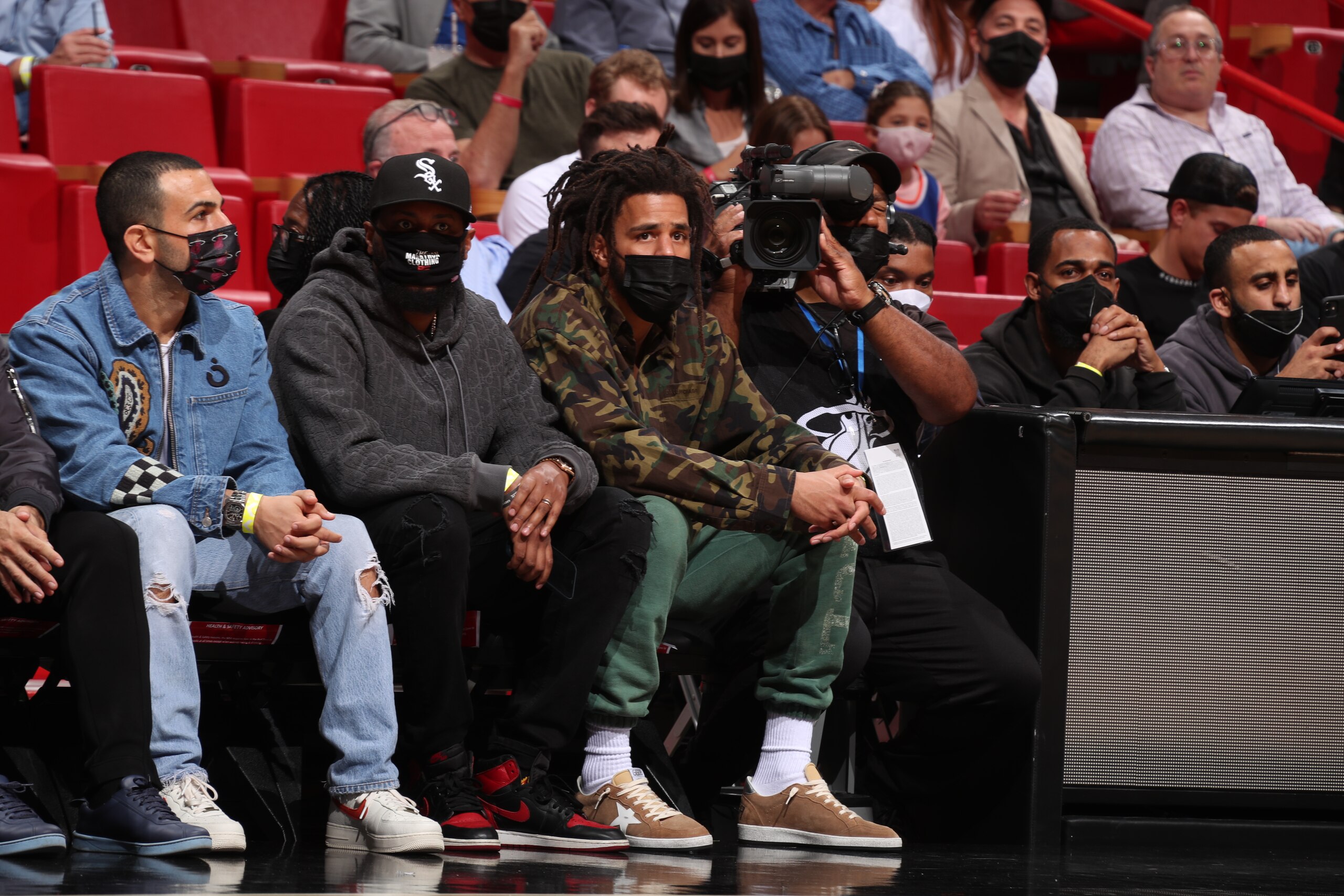 MIAMI, FL - JANUARY 26: Rapper, J. Cole attends the game between the New York Knicks and the Miami Heat on January 26, 2021 at FTX Arena in Miami, Florida. NOTE TO USER: User expressly acknowledges and agrees that, by downloading and or using this Photograph, user is consenting to the terms and conditions of the Getty Images License Agreement. Mandatory Copyright Notice: Copyright 2022 NBAE (Photo by Issac Baldizon/NBAE via Getty Images)