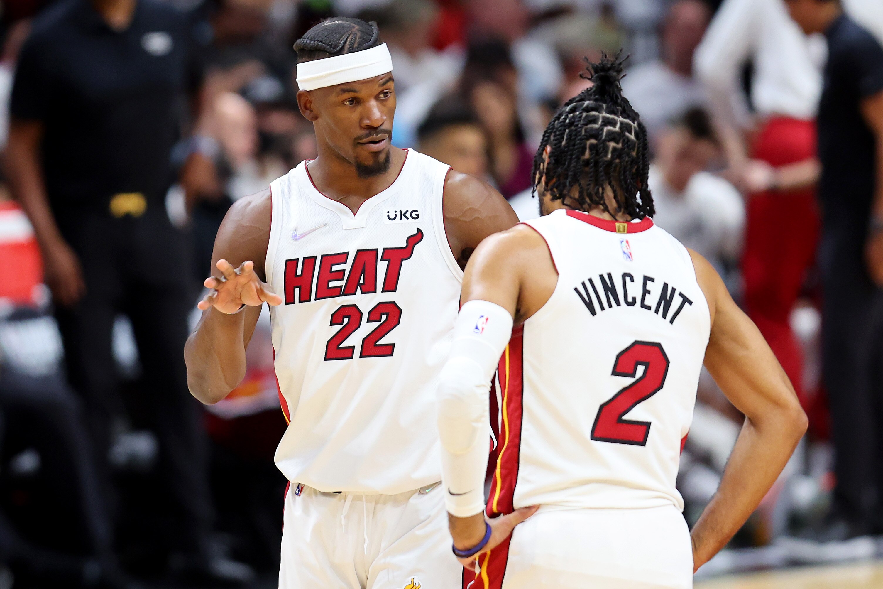 MIAMI, FLORIDA - MAY 19: Jimmy Butler #22 and Gabe Vincent #2 of the Miami Heat talk during the first quarter against the Boston Celtics in Game Two of the 2022 NBA Playoffs Eastern Conference Finals at FTX Arena on May 19, 2022 in Miami, Florida. NOTE TO USER: User expressly acknowledges and agrees that, by downloading and or using this photograph, User is consenting to the terms and conditions of the Getty Images License Agreement. (Photo by Michael Reaves/Getty Images)