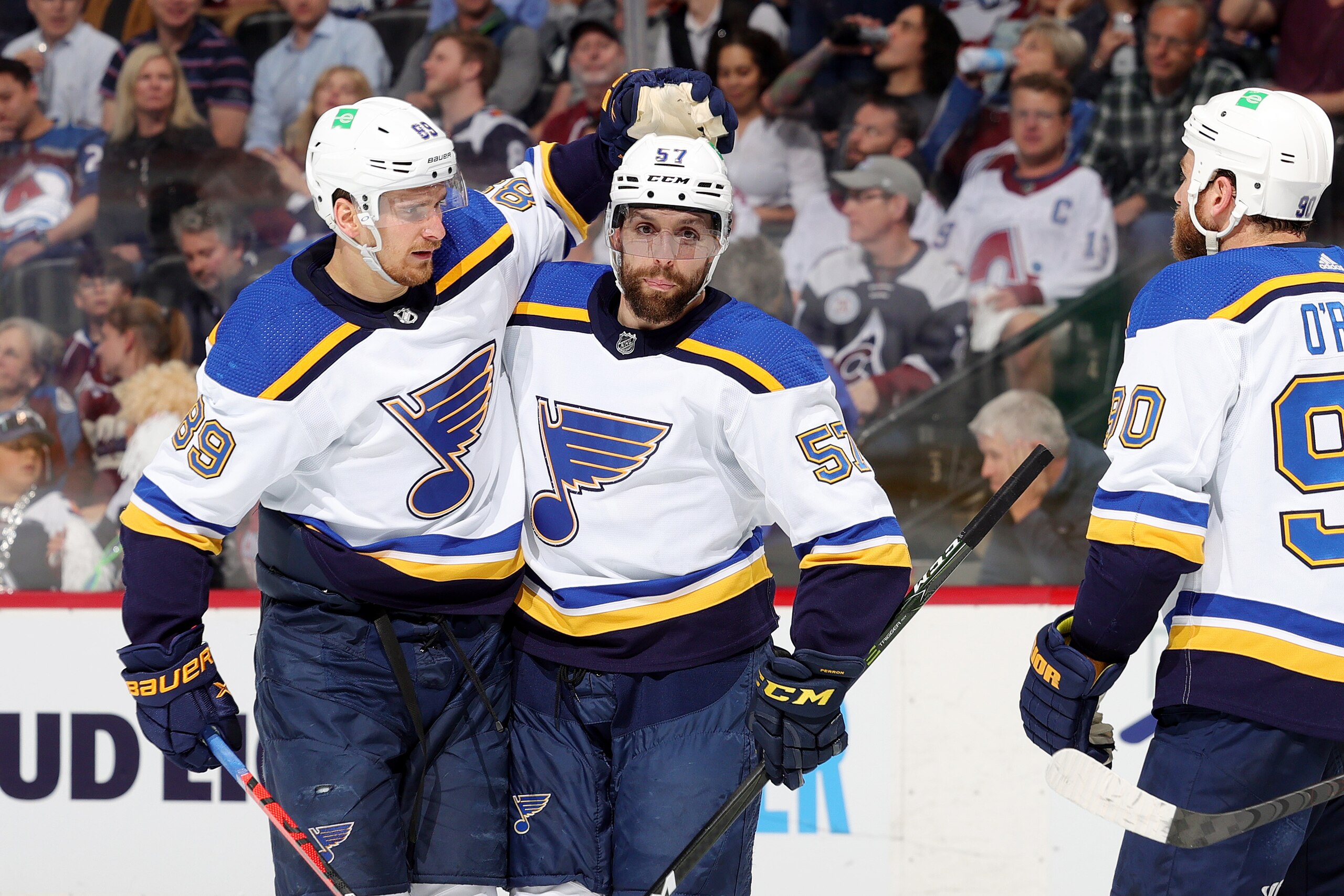 DENVER, COLORADO - MAY 19: Pavel Buchnevich #89, David Perron #57 and Ryan O'Reilly #90 of the St. Louis Blues celebrate a goal against the Colorado Avalanche in Game Two of the Second Round of the 2022 Stanley Cup Playoffs at Ball Arena on May 19, 2022 in Denver, Colorado. (Photo by Michael Martin/NHLI via Getty Images)