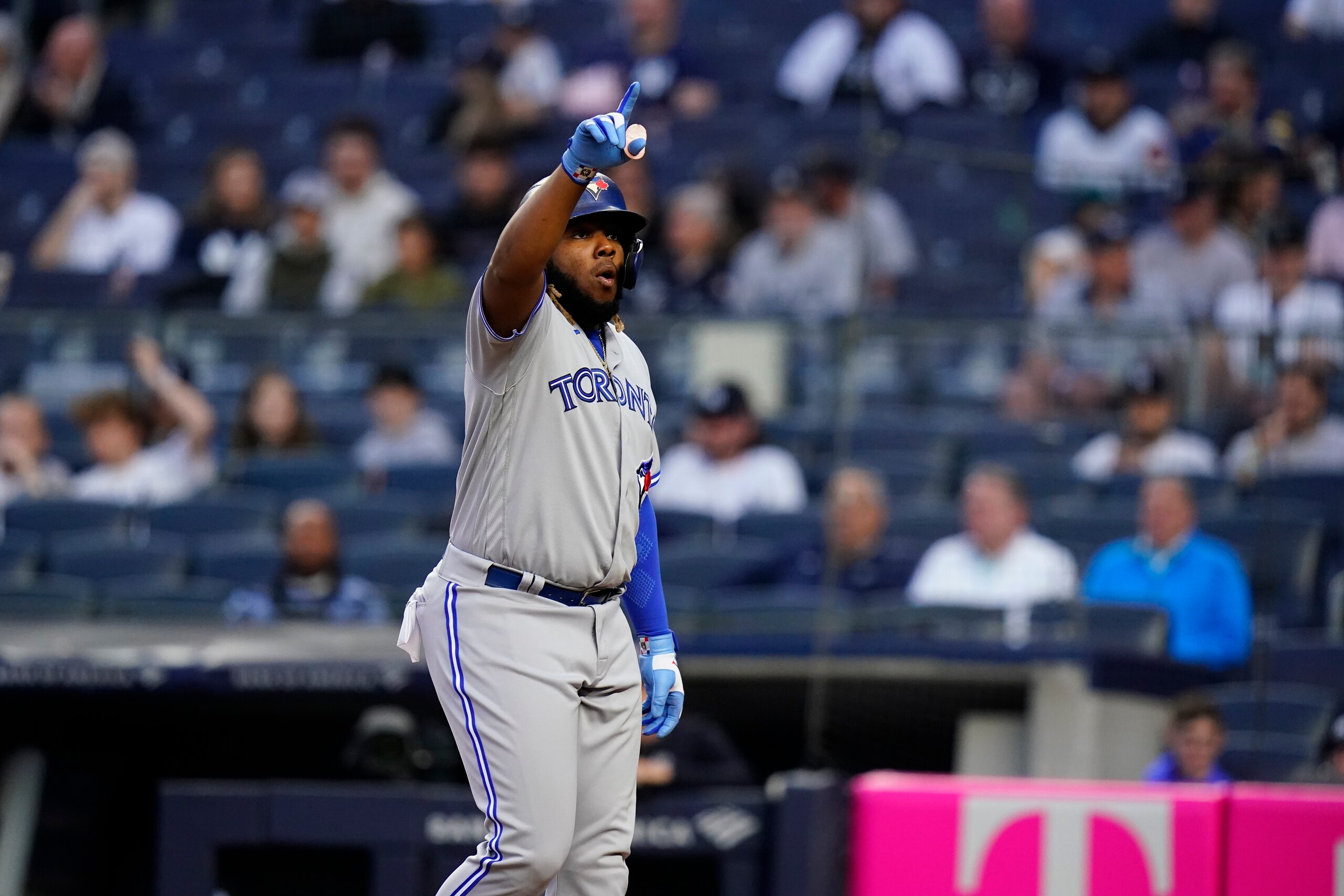 Toronto Blue Jays' Vladimir Guerrero Jr. celebrates after hitting a home run during the first inning of a baseball game against the New York Yankees Wednesday, April 13, 2022, in New York. (AP Photo/Frank Franklin II)