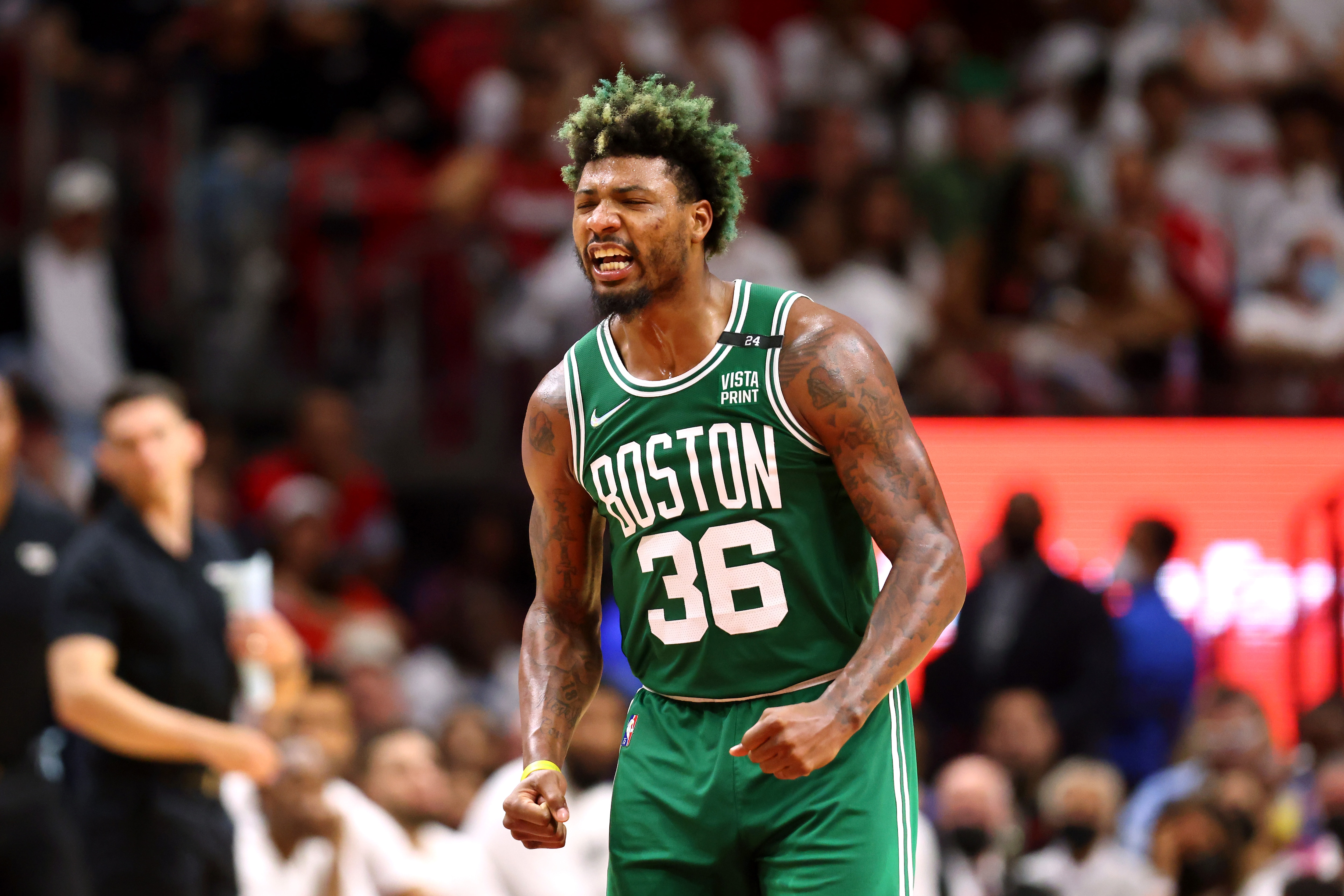 MIAMI, FLORIDA - MAY 19: Marcus Smart #36 of the Boston Celtics reacts after a three point basket during the fourth quarter against the Miami Heat in Game Two of the 2022 NBA Playoffs Eastern Conference Finals at FTX Arena on May 19, 2022 in Miami, Florida. NOTE TO USER: User expressly acknowledges and agrees that, by downloading and or using this photograph, User is consenting to the terms and conditions of the Getty Images License Agreement. (Photo by Michael Reaves/Getty Images)