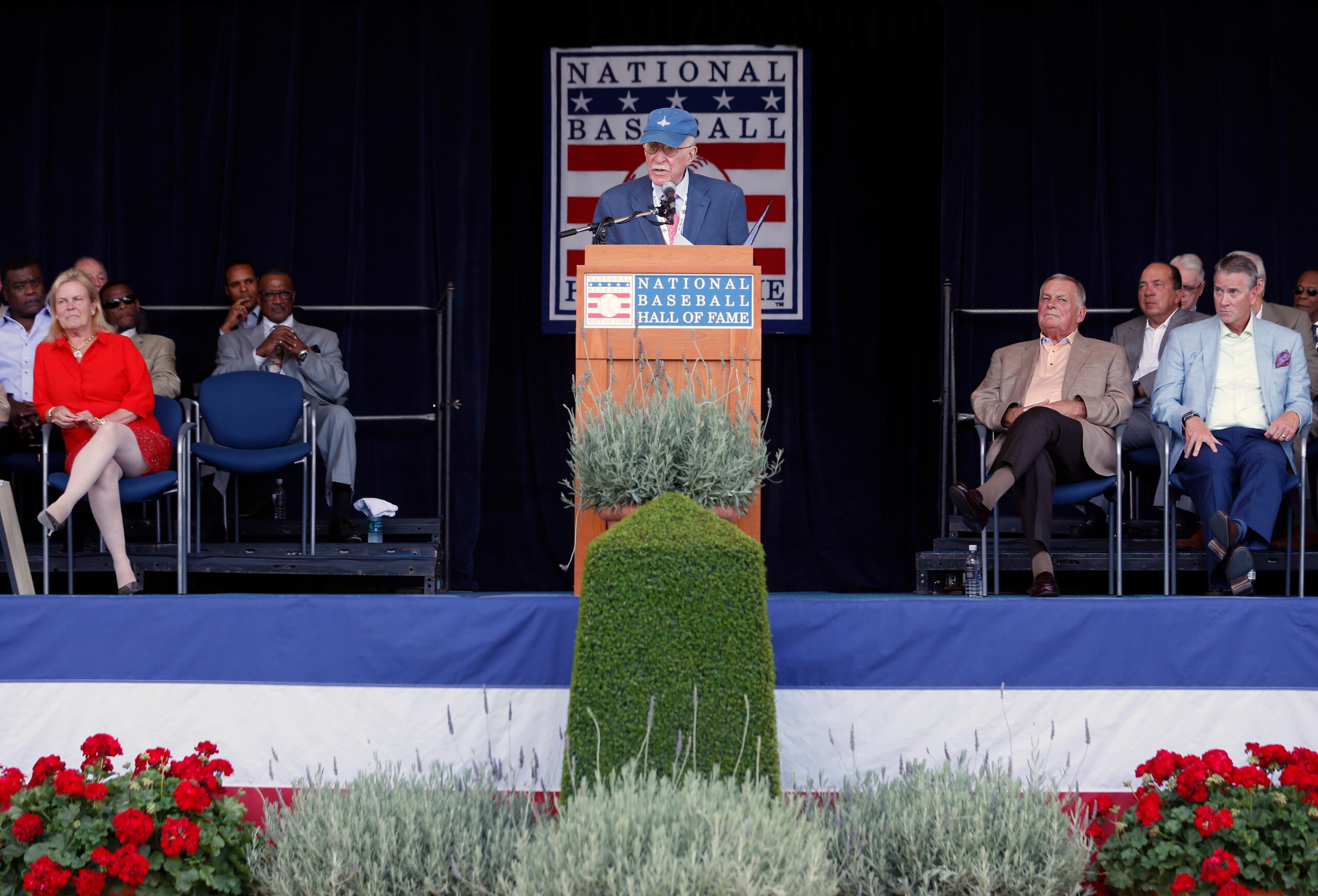 Roger Angell of The New Yorker is introduced before receiving the J.G. Taylor Spink Award during a ceremony at Doubleday Field on Saturday, July 26, 2014, in Cooperstown, N.Y. (AP Photo/Mike Groll)
