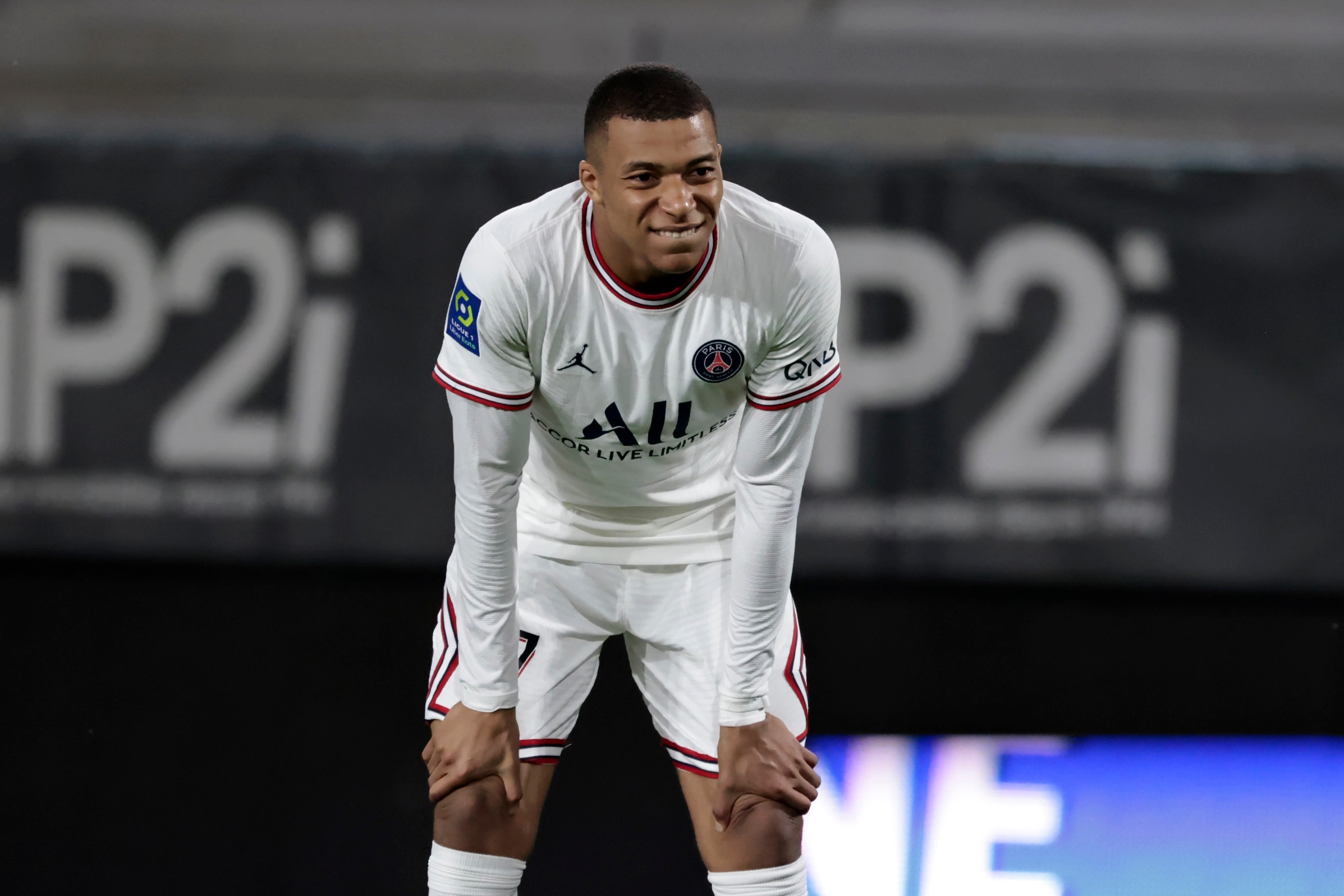 PSG's Kylian Mbappe smiles during the League One soccer match between Angers and Paris Saint Germain, at the Raymond-Kopa stadium in Angers, western France, Wednesday, April 20, 2022. (AP Photo/Jeremias Gonzalez)