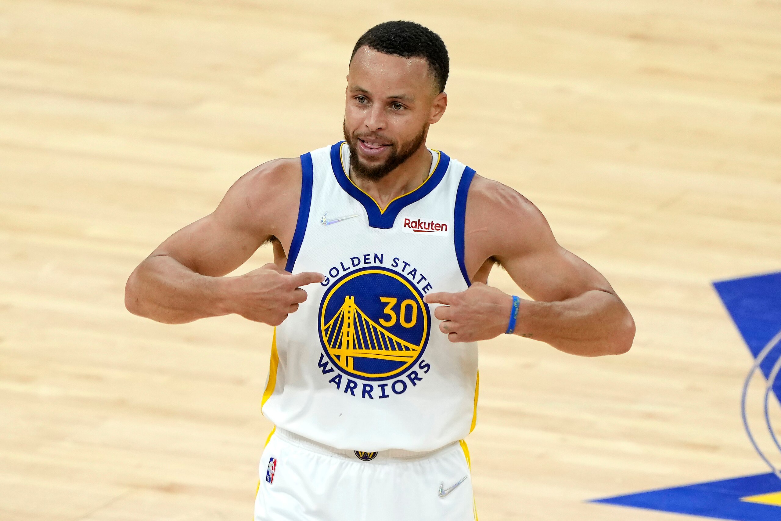 SAN FRANCISCO, CALIFORNIA - MAY 20: Stephen Curry #30 of the Golden State Warriors reacts after a play during the fourth quarter against the Dallas Mavericks in Game Two of the 2022 NBA Playoffs Western Conference Finals at Chase Center on May 20, 2022 in San Francisco, California. NOTE TO USER: User expressly acknowledges and agrees that, by downloading and/or using this photograph, User is consenting to the terms and conditions of the Getty Images License Agreement. (Photo by Thearon W. Henderson/Getty Images)