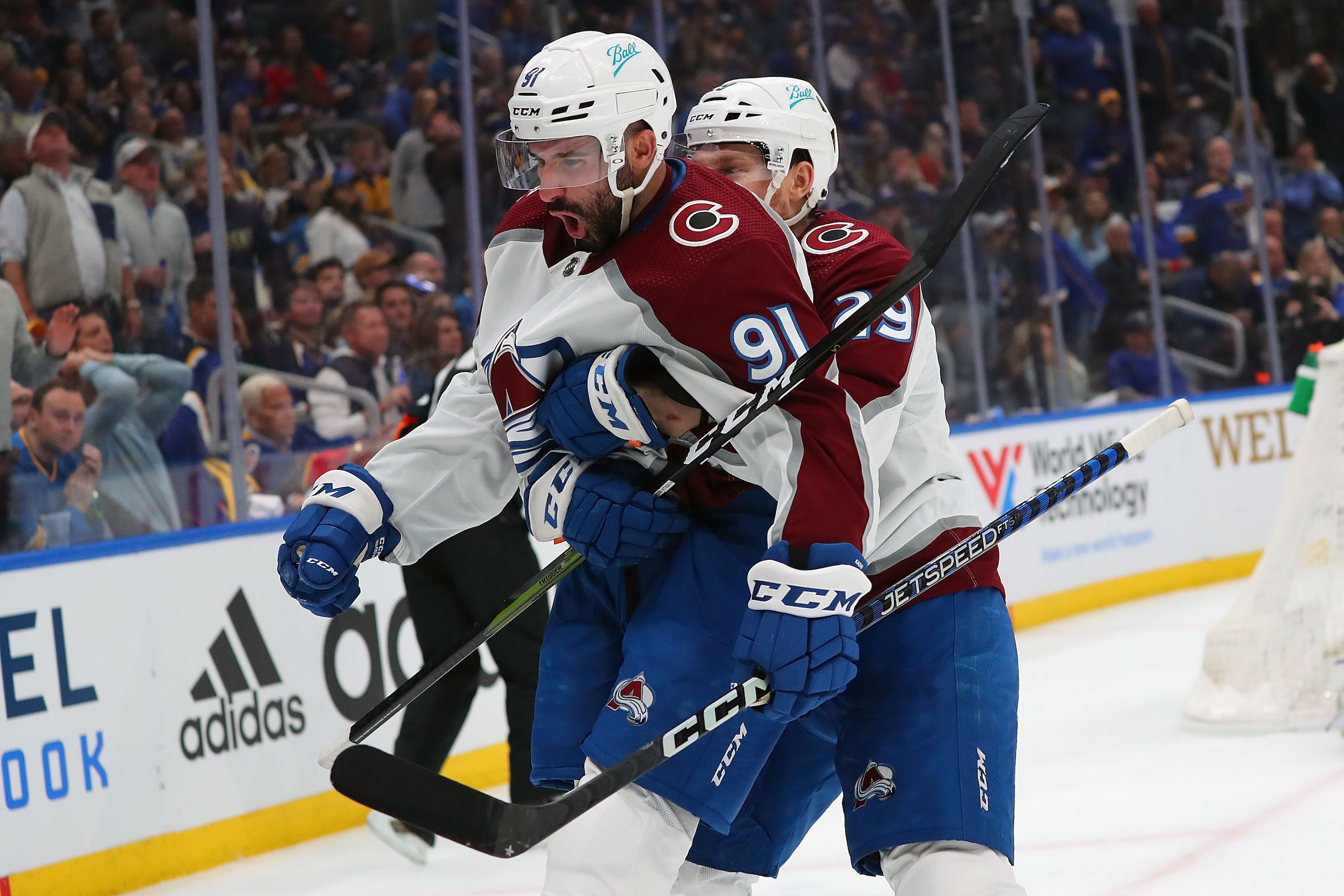 ST LOUIS, MO - MAY 21:  (L-R) Nazem Kadri #91 and Nathan MacKinnon #29 of the Colorado Avalanche celebrate Kadri's goal against the St. Louis Blues in the second period during Game Three of the Second Round of the 2022 Stanley Cup Playoffs at Enterprise Center on May 21, 2022 in St Louis, Missouri. (Photo by Dilip Vishwanat/Getty Images)