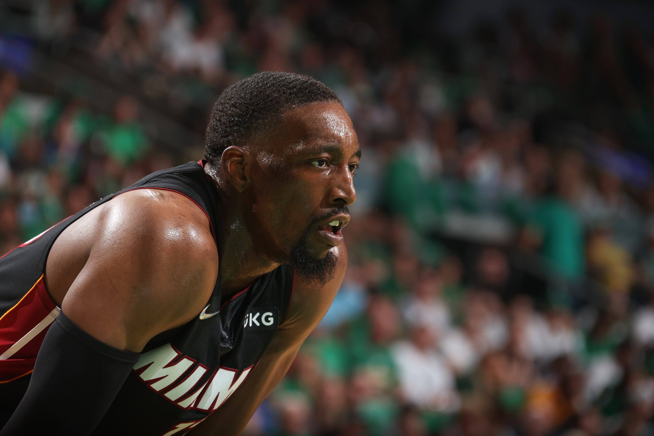 BOSTON, MA - MAY 21: Bam Adebayo #13 of the Miami Heat looks on during Game 3 of the 2022 NBA Playoffs Eastern Conference Finals on May 21, 2022 at the TD Garden in Boston, Massachusetts.  NOTE TO USER: User expressly acknowledges and agrees that, by downloading and or using this photograph, User is consenting to the terms and conditions of the Getty Images License Agreement. Mandatory Copyright Notice: Copyright 2022 NBAE  (Photo by Nathaniel S. Butler/NBAE via Getty Images)