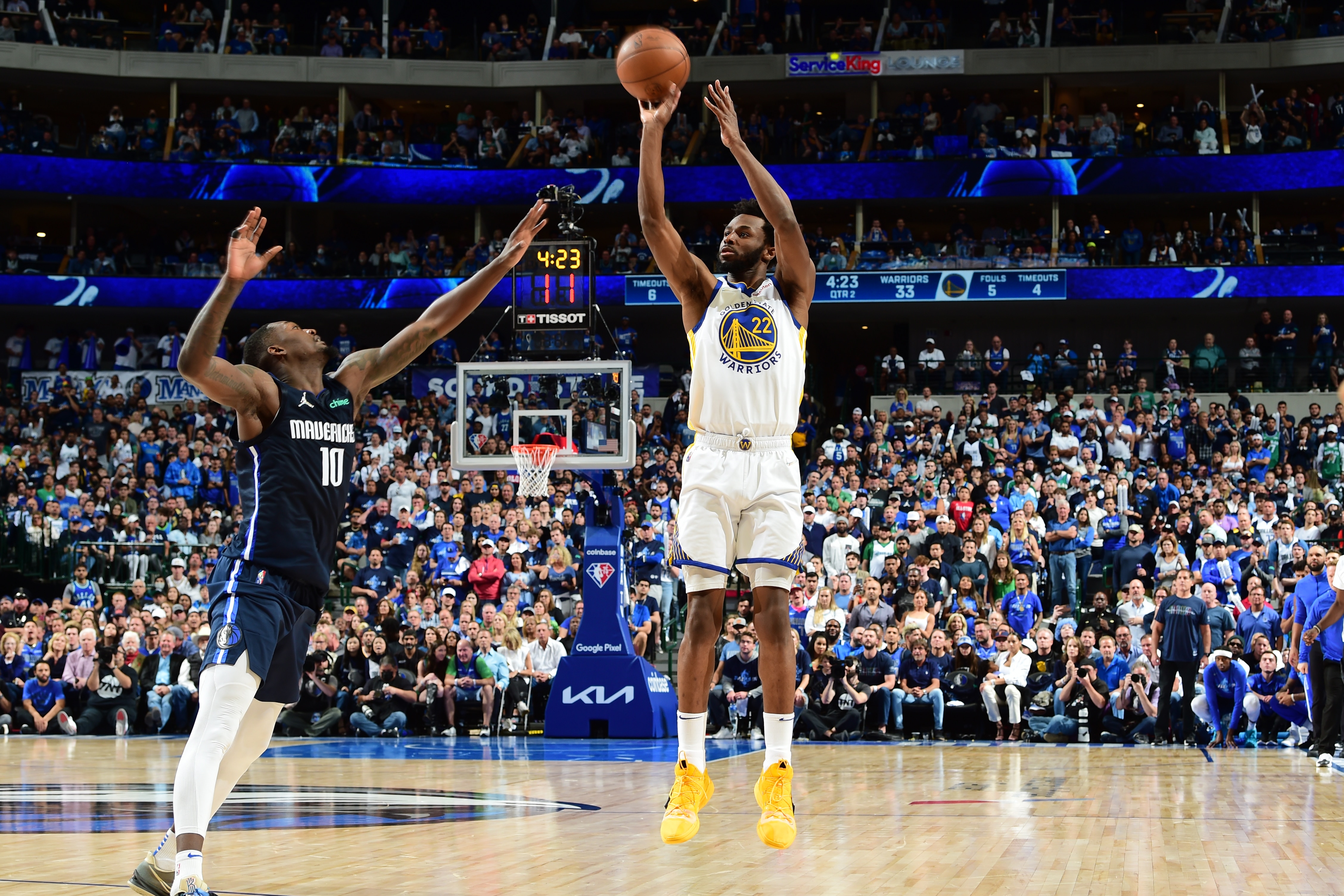 DALLAS, TX - May 22: Andrew Wiggins #22 of the Golden State Warriors shoots the ball against the Dallas Mavericks during Game 3 of the 2022 NBA Playoffs Western Conference Finals on MAY 22, 2022 at the American Airlines Center in Dallas, Texas. NOTE TO USER: User expressly acknowledges and agrees that, by downloading and or using this photograph, User is consenting to the terms and conditions of the Getty Images License Agreement. Mandatory Copyright Notice: Copyright 2022 NBAE (Photo by Noah Graham/NBAE via Getty Images)