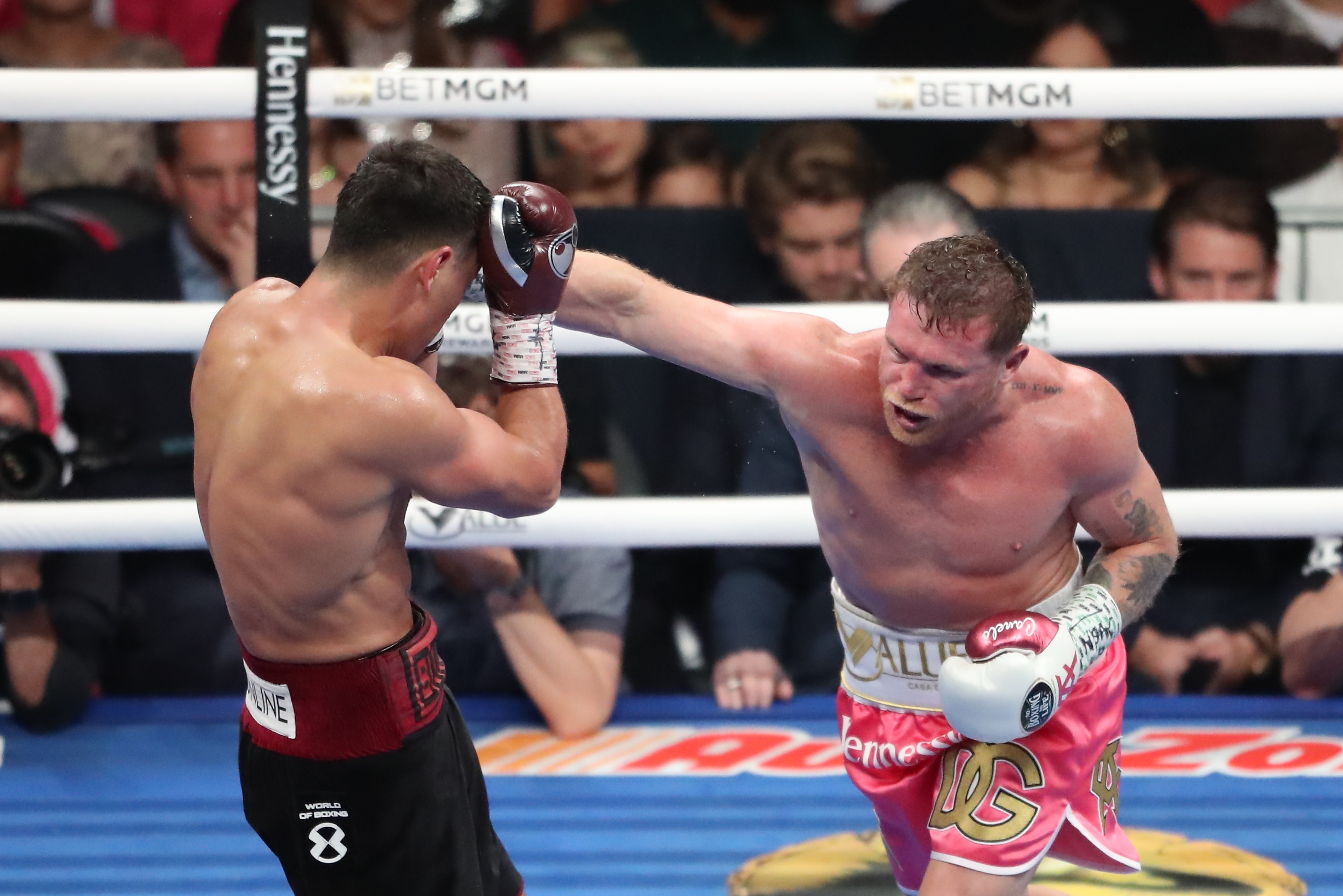LAS VEGAS, NV - MAY 7: (R-L) Boxer Canelo Álvarez punches Dmitry Bivol during their fight at the T-Mobile Arena on May 7, 2022 in Las Vegas, Nevada, USA. 
(Photo by Alejandro Salazar/PxImages/Icon Sportswire via Getty Images)