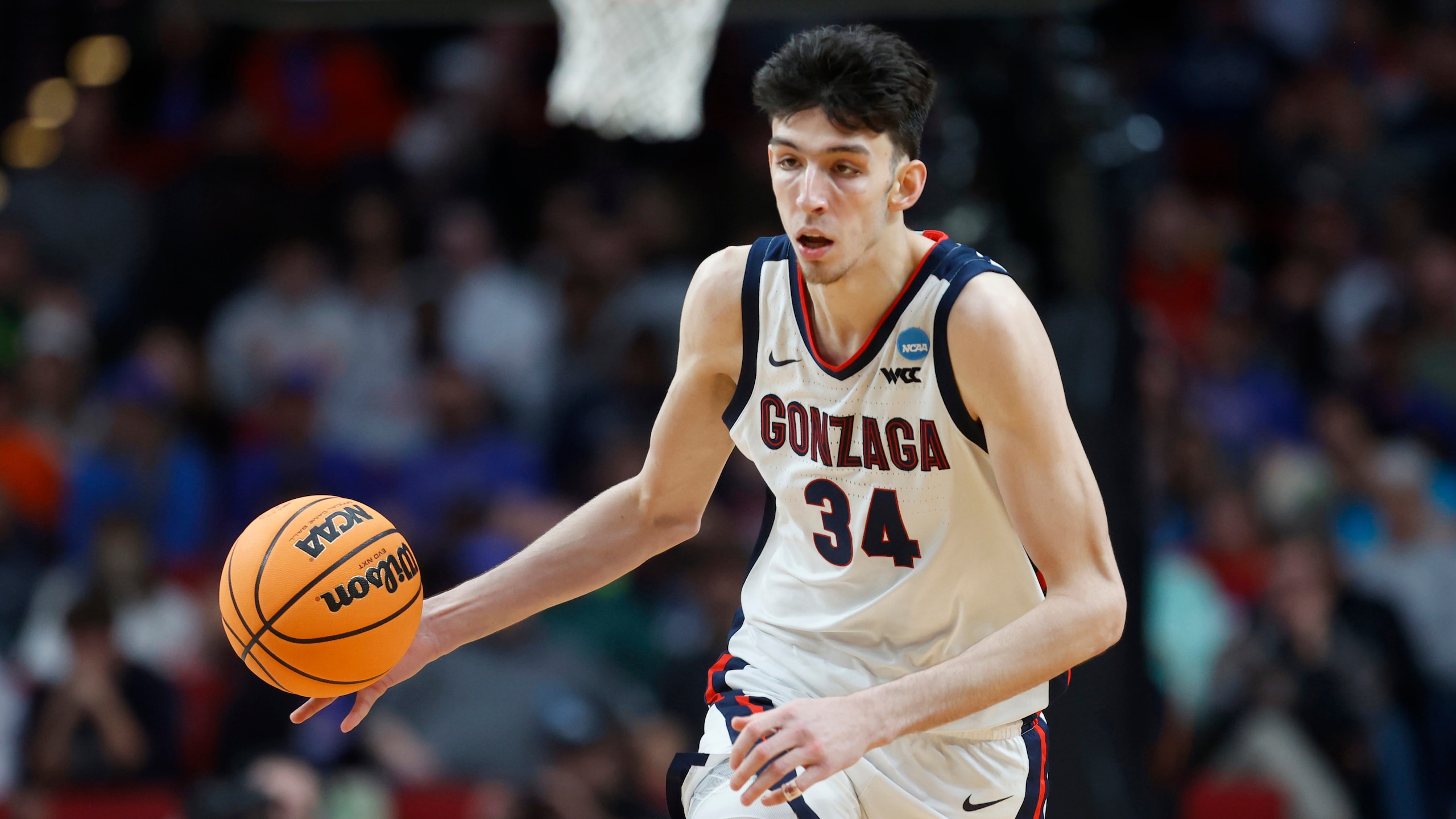 Gonzaga center Chet Holmgren (34) moves the ball against Georgia State during the second half of a first round NCAA college basketball tournament game, Thursday, March 17, 2022, in Portland, Ore. (AP Photo/Craig Mitchelldyer)