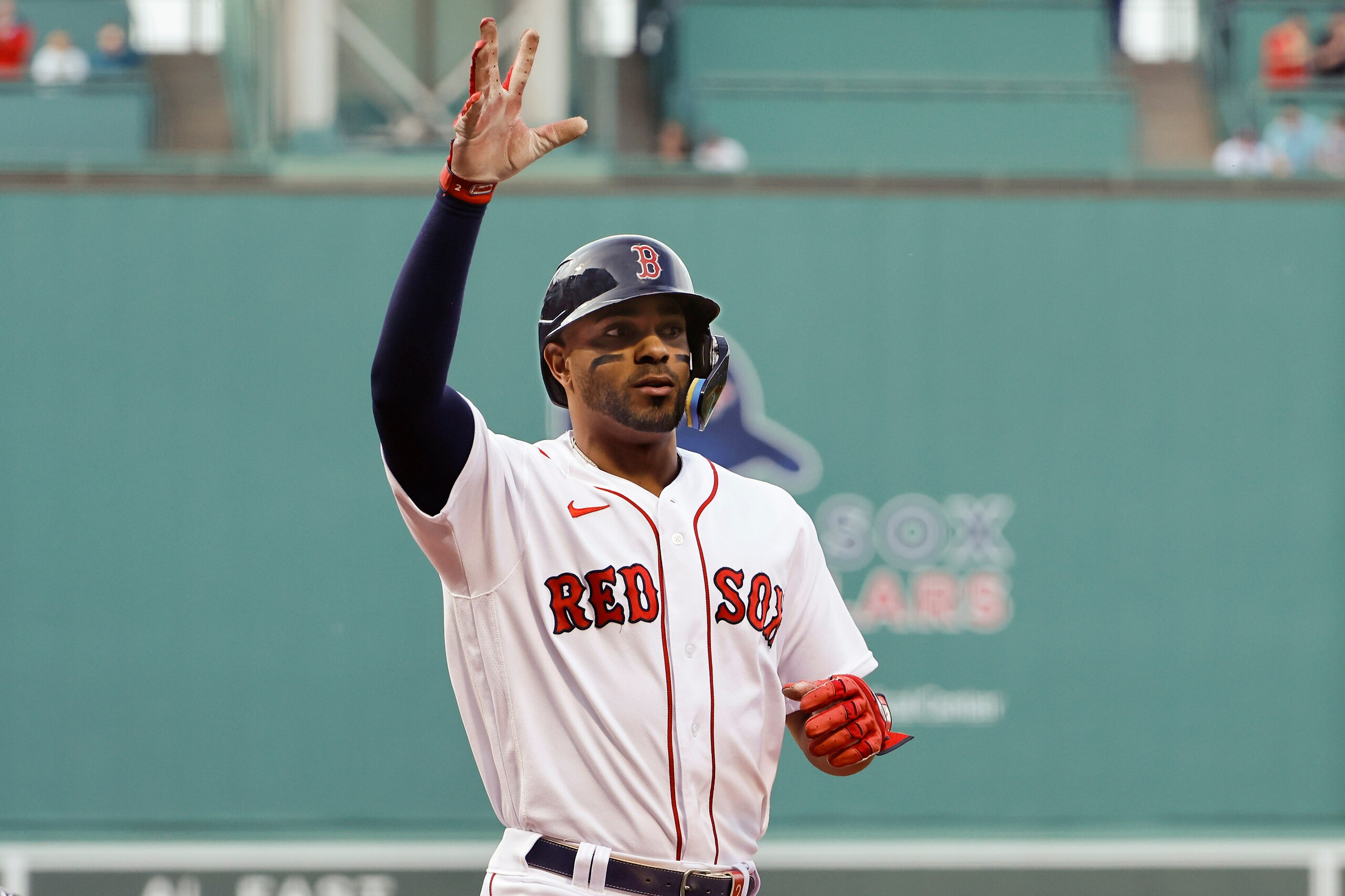 BOSTON, MA - MAY 18: Xander Bogaerts #2 of the Boston Red Sox waves to the crowd after this home run against the Houston Astros during the first inning at Fenway Park on May 18, 2022 in Boston, Massachusetts. (Photo By Winslow Townson/Getty Images)