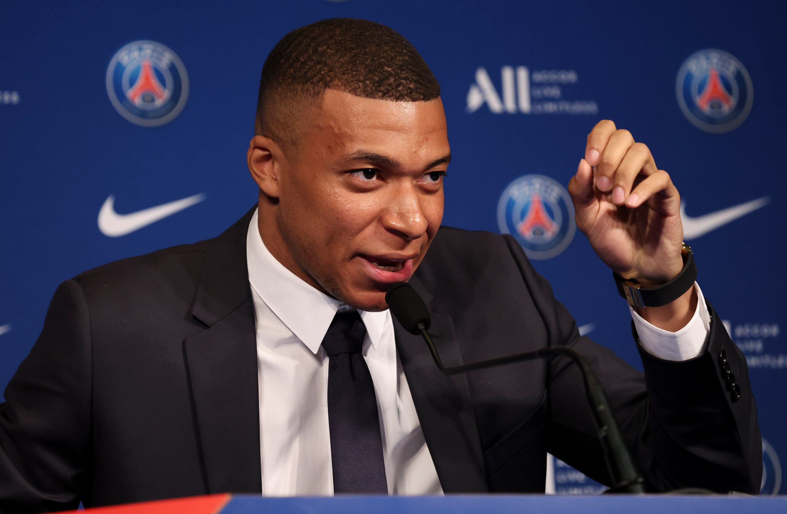 PARIS, FRANCE - MAY 23: Kylian Mbappe of PSG during a press conference - along President of PSG Nasser Al Khelaifi - about his new contract with Paris Saint-Germain at the auditorium of Parc des Princes stadium on May 23, 2022 in Paris, France. (Photo by John Berry/Getty Images)