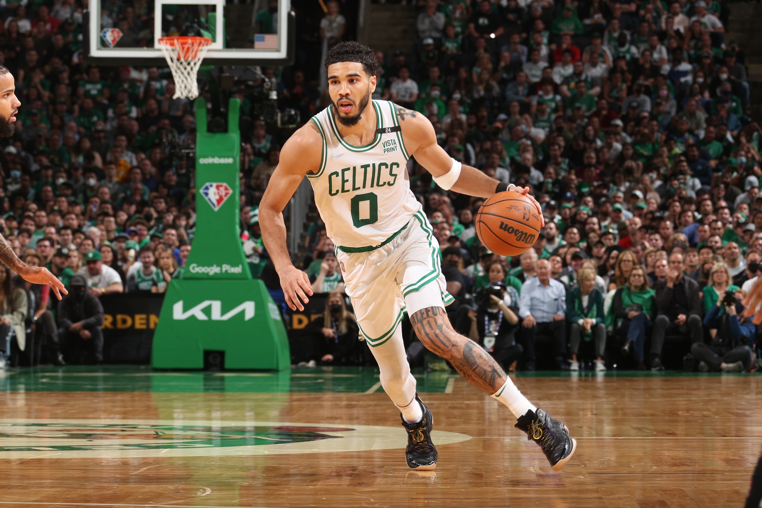 BOSTON, MA - MAY 23: Jayson Tatum #0 of the Boston Celtics drives to the basket against the Miami Heat during Game 4 of the 2022 NBA Playoffs Eastern Conference Finals on May 23, 2022 at the TD Garden in Boston, Massachusetts.  NOTE TO USER: User expressly acknowledges and agrees that, by downloading and or using this photograph, User is consenting to the terms and conditions of the Getty Images License Agreement. Mandatory Copyright Notice: Copyright 2022 NBAE  (Photo by Nathaniel S. Butler/NBAE via Getty Images)