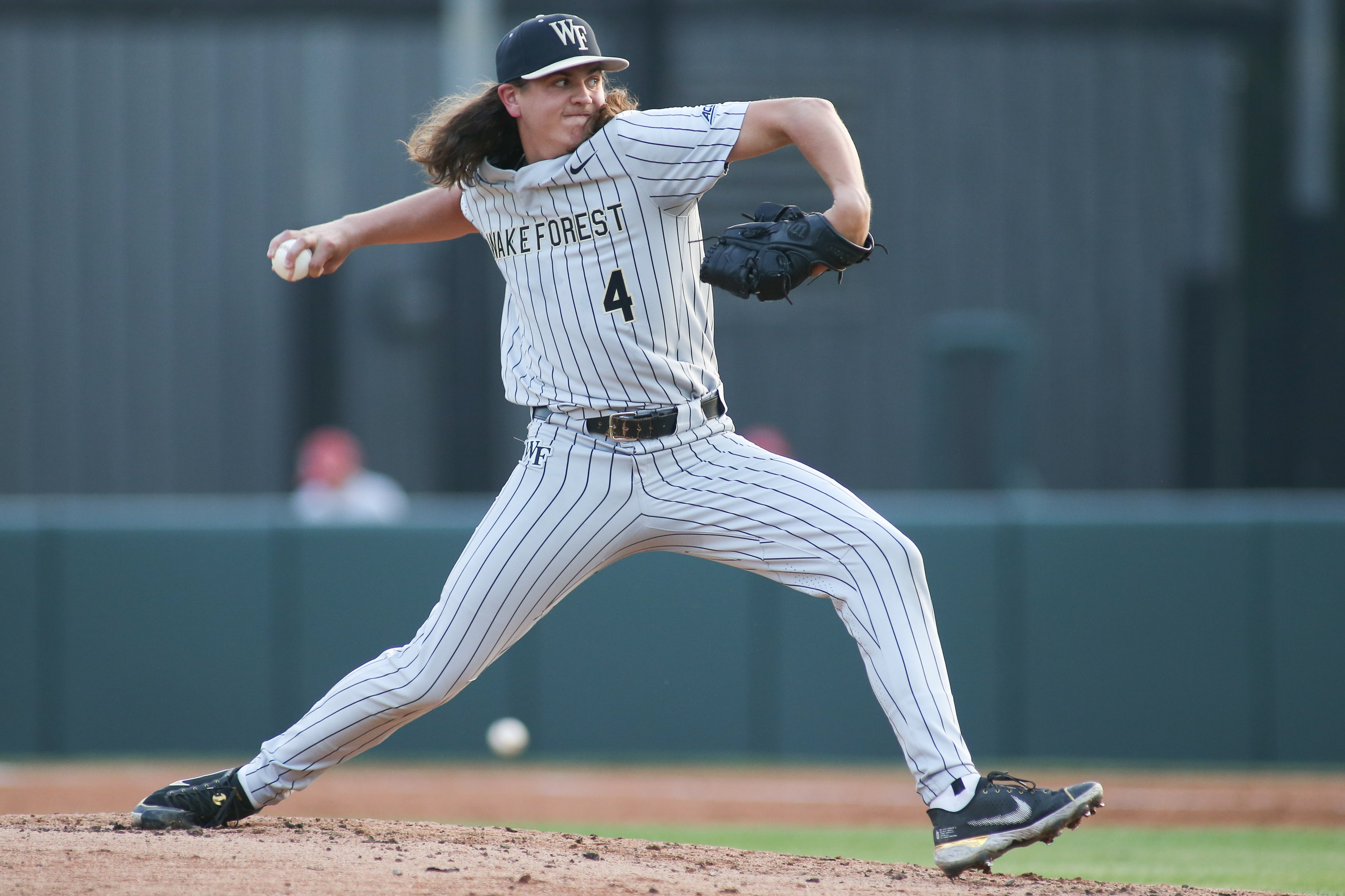 RALEIGH, NC - MAY 19: Wake Forest Demon Deacons pitcher Rhett Lowder (4) pitches during the first game of the series between the Wake Forest Demon Deacons and the North Carolina State Wolfpack on May 19, 2022 on Doak Field At Dail Park. (Photo by Nicholas Faulkner/Icon Sportswire via Getty Images)