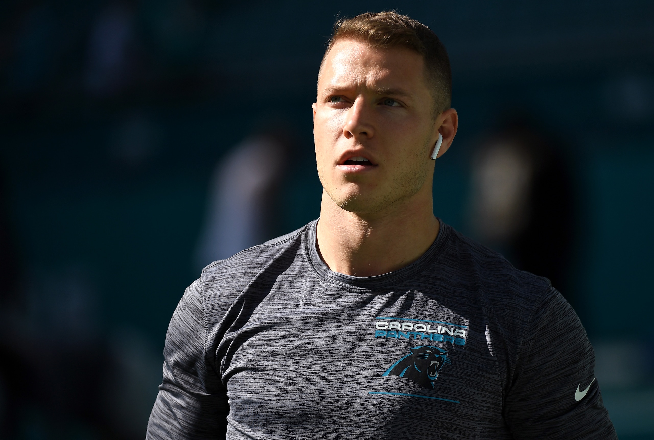 MIAMI GARDENS, FLORIDA - NOVEMBER 28: Christian McCaffrey #22 of the Carolina Panthers walks on to the field during pregame warm-ups before the game against the Miami Dolphins at Hard Rock Stadium on November 28, 2021 in Miami Gardens, Florida. (Photo by Eric Espada/Getty Images)