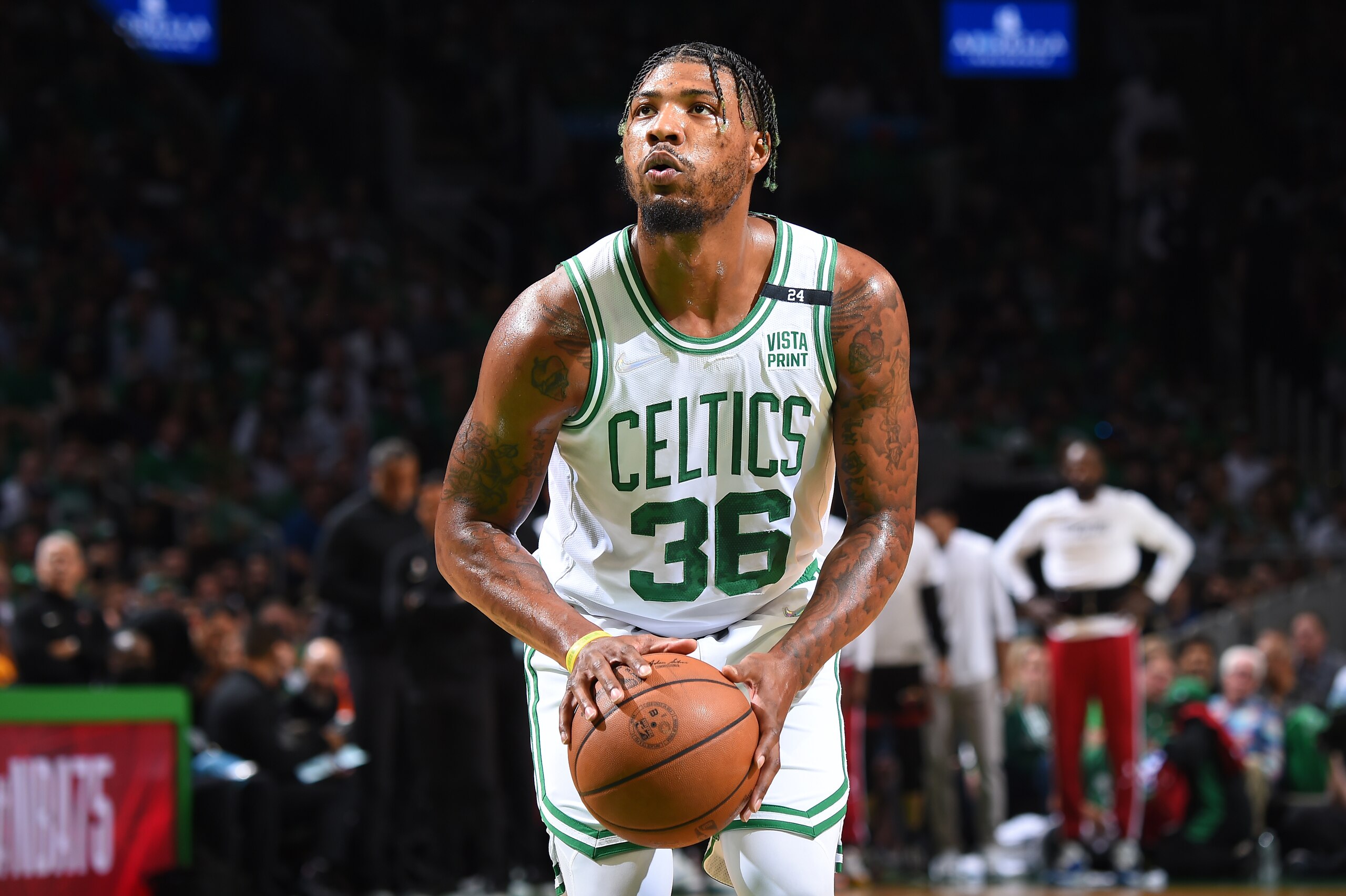 BOSTON, MA - MAY 21: Marcus Smart #36 of the Boston Celtics shoots a free throw against the Miami Heat during Game 3 of the 2022 NBA Playoffs Eastern Conference Finals on May 21, 2022 at the TD Garden in Boston, Massachusetts.  NOTE TO USER: User expressly acknowledges and agrees that, by downloading and or using this photograph, User is consenting to the terms and conditions of the Getty Images License Agreement. Mandatory Copyright Notice: Copyright 2022 NBAE  (Photo by Brian Babineau/NBAE via Getty Images)