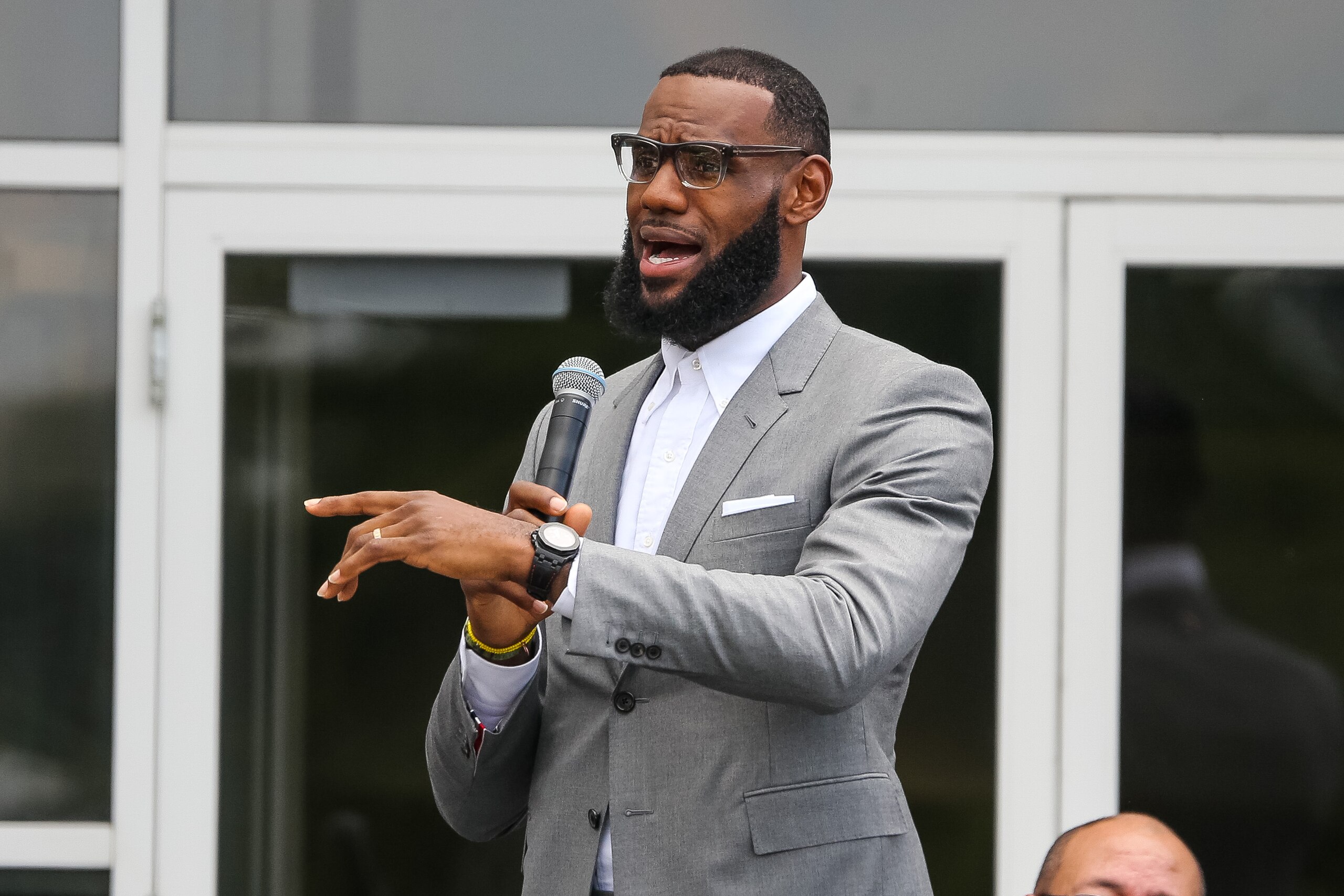 AKRON, OH - JULY 30: LeBron James addresses a crowd of students, parents, local officials and sponsors at the grand opening of the I Promise school on July 30, 2018 in Akron, Ohio. The new school is a partnership between the LeBron James Family foundation and Akron Public Schools. NOTE TO USER: User expressly acknowledges and agrees that, by downloading and/or using this Photograph, user is consenting to the terms and conditions of the Getty Images License Agreement. Mandatory Copyright Notice: Copyright 2018 NBAE (Photo by Allison Farrand/NBAE via Getty Images)