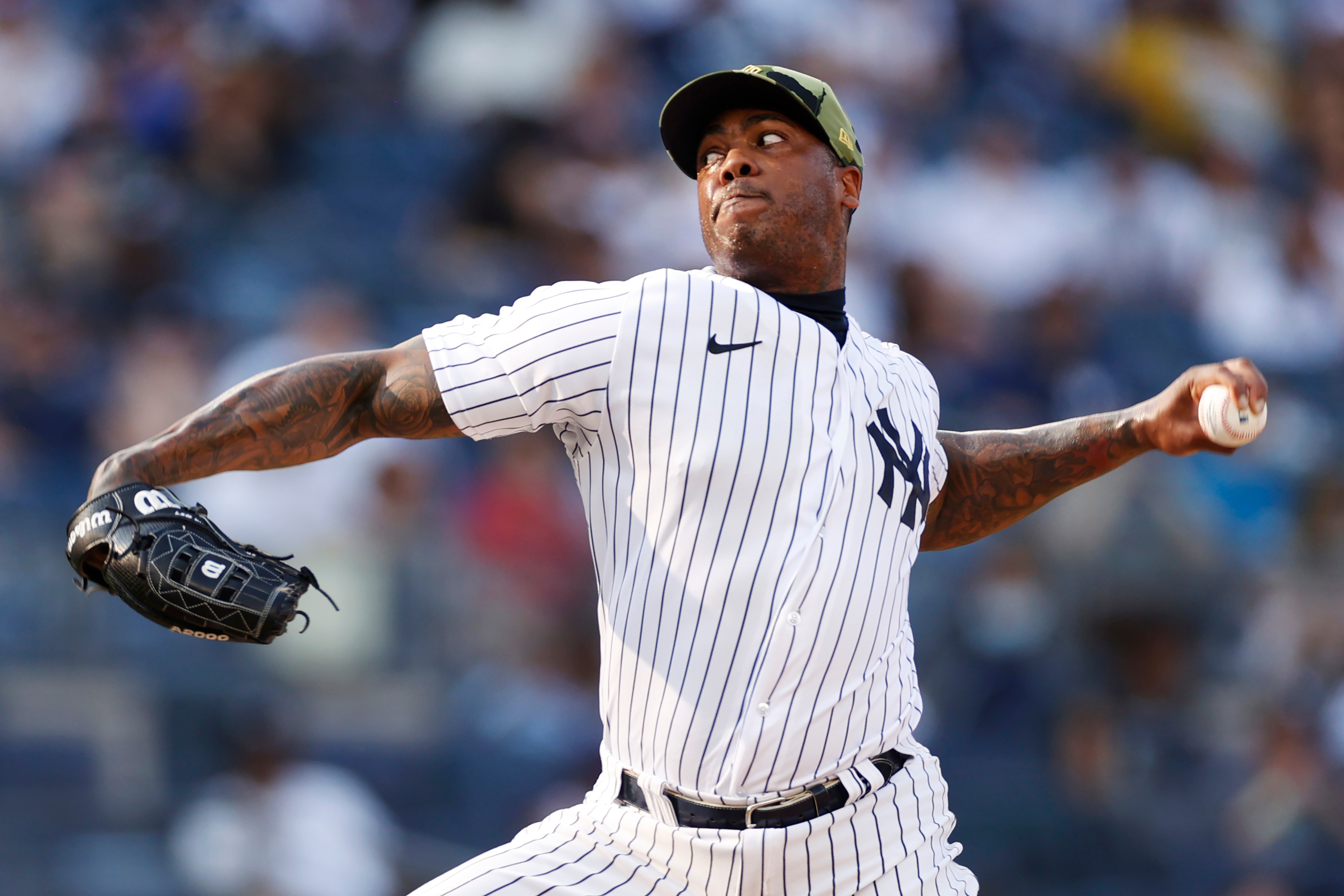 NEW YORK, NEW YORK - MAY 22: Aroldis Chapman #54 of the New York Yankees pitches during the ninth inning of Game One of a doubleheader against the Chicago White Sox at Yankee Stadium on May 22, 2022 in the Bronx borough of New York City. The White Sox won 3-1. (Photo by Sarah Stier/Getty Images)