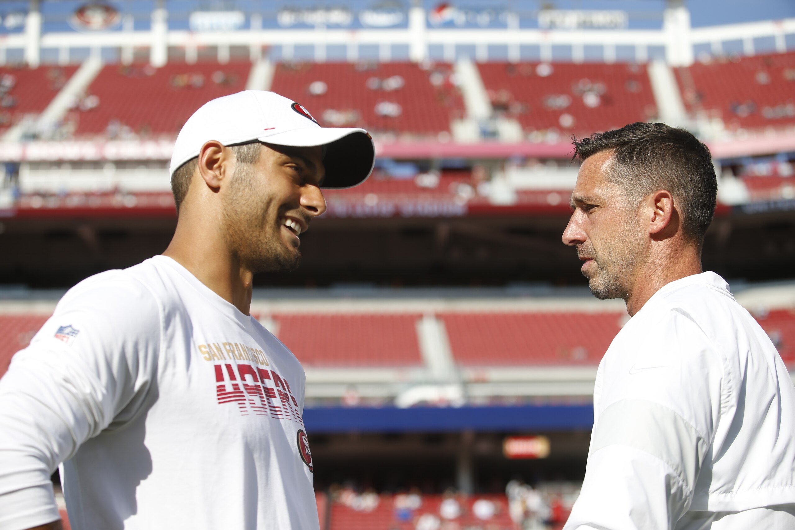 SANTA CLARA, CA - AUGUST 10: Jimmy Garoppolo #10 and Head Coach Kyle Shanahan of the San Francisco 49ers talk on the field prior to the game against the Dallas Cowboys at Levi's Stadium on August 10, 2019 in Santa Clara, California. The 49ers defeated the Cowboys 17-9. (Photo by Michael Zagaris/San Francisco 49ers/Getty Images)