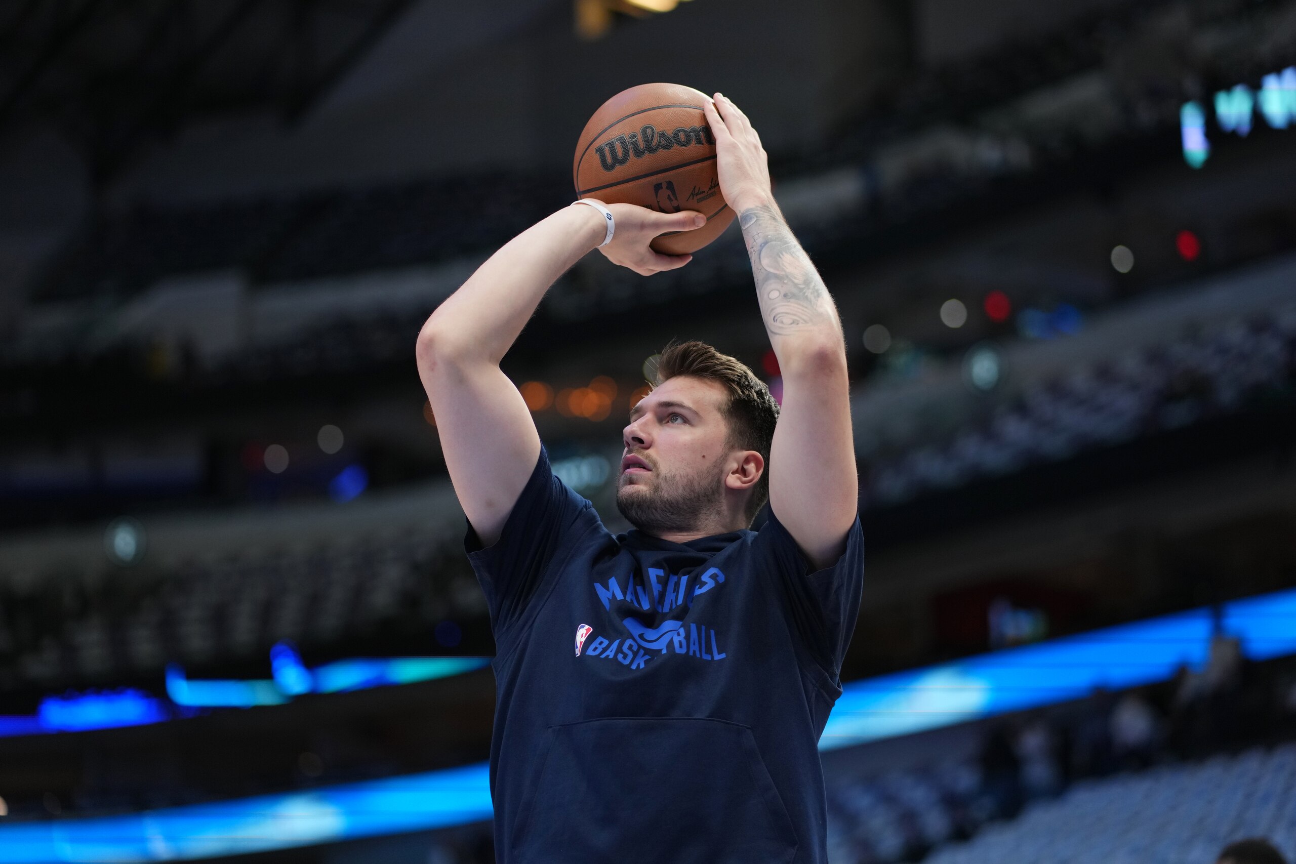 DALLAS, TX - MAY 24: Luka Doncic #77 of the Dallas Mavericks warms up before Game 4 of the 2022 NBA Playoffs Western Conference Finals on May 24, 2022 at the American Airlines Center in Dallas, Texas. NOTE TO USER: User expressly acknowledges and agrees that, by downloading and or using this photograph, User is consenting to the terms and conditions of the Getty Images License Agreement. Mandatory Copyright Notice: Copyright 2022 NBAE (Photo by Cooper Neill/NBAE via Getty Images)
