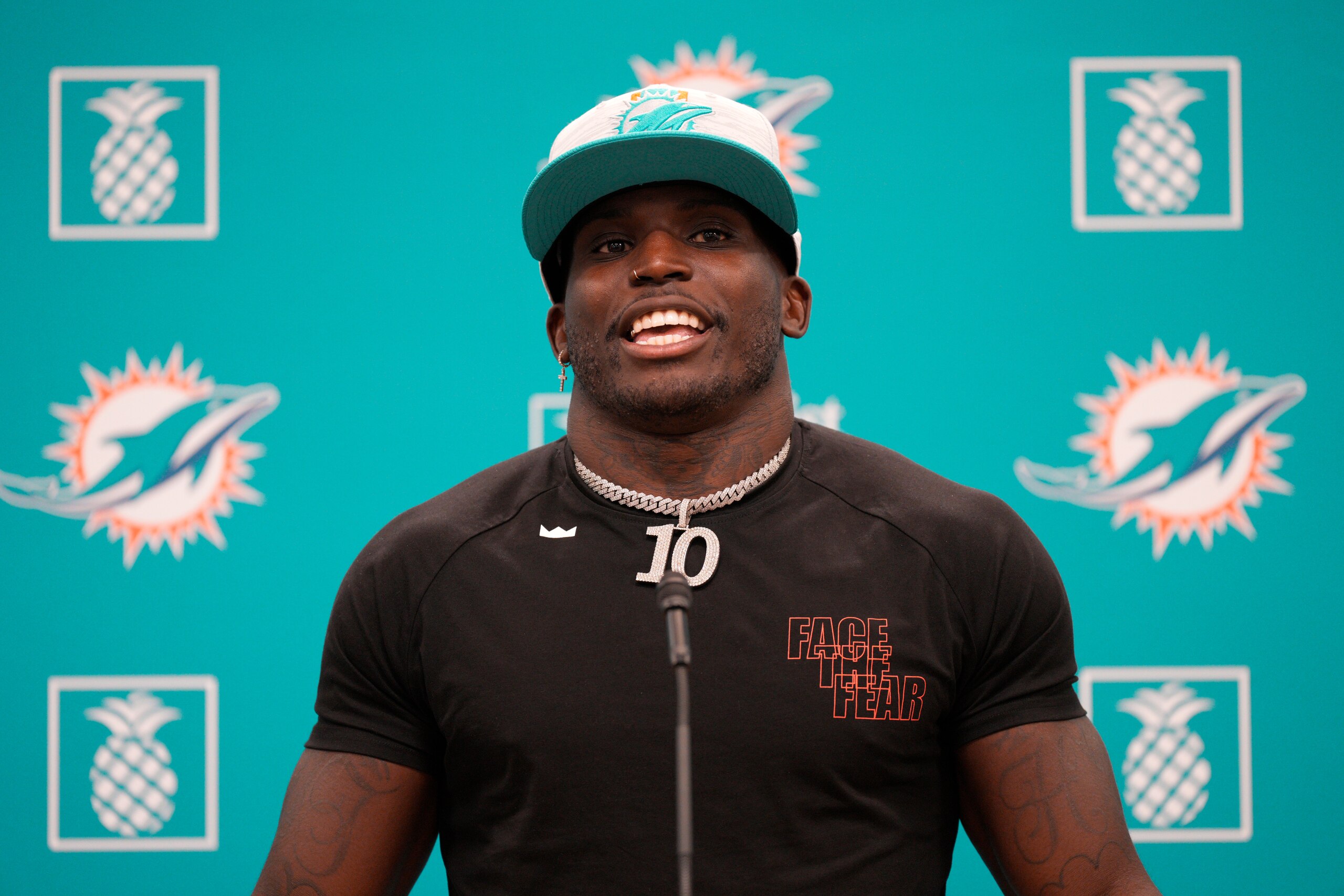 MIAMI GARDENS, FLORIDA - MARCH 24: Tyreek Hill speaks with the media after being introduced by the Miami Dolphins at Baptist Health Training Complex on March 24, 2022 in Miami Gardens, Florida. (Photo by Mark Brown/Getty Images)