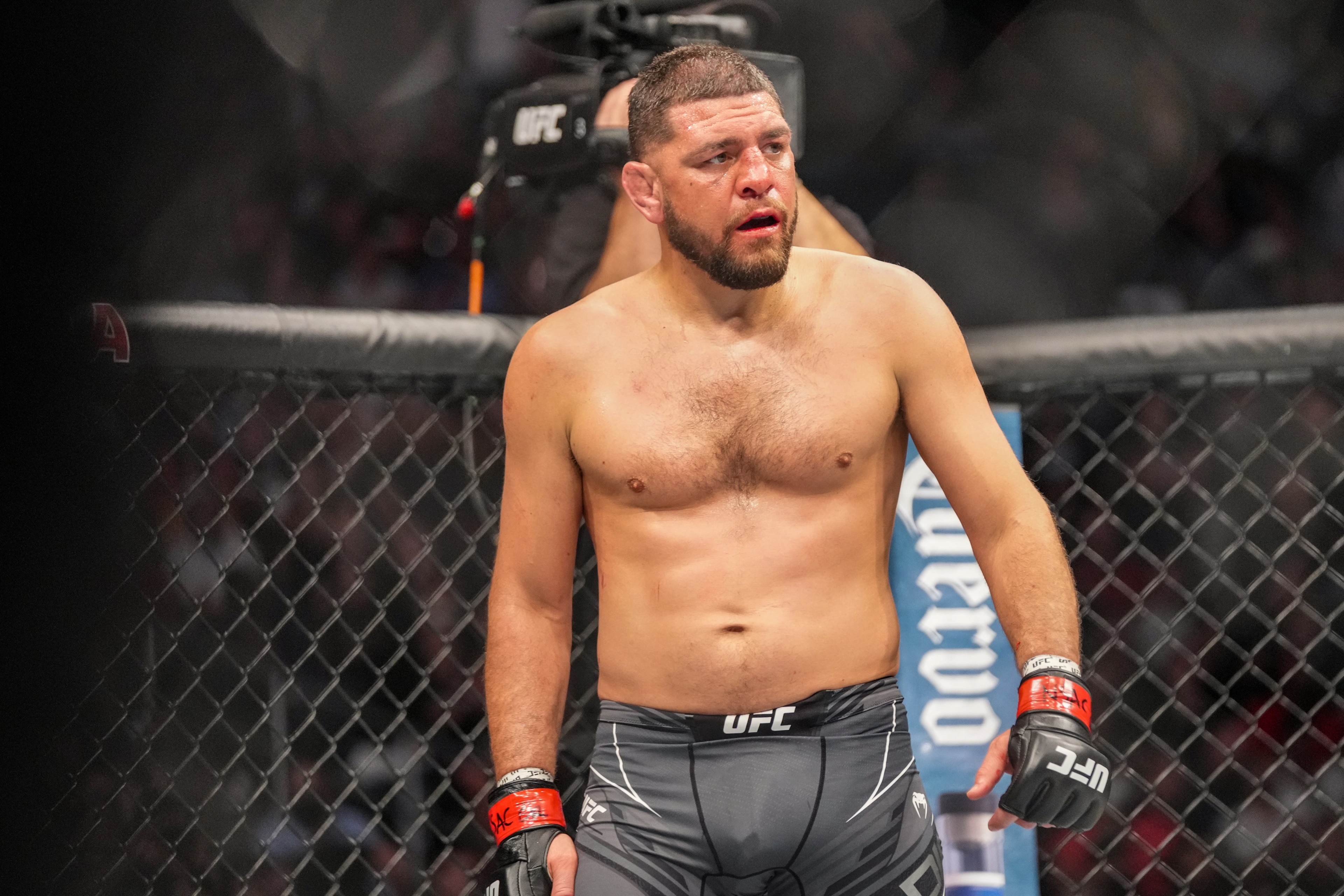 LAS VEGAS, NV - SEPTEMBER 25: Nick Diaz in his  middleweight fight during UFC 266 on September 25, 2021, at T-Mobile Arena in Las Vegas, NV. (Photo by Louis Grasse/PxImages/Icon Sportswire via Getty Images)