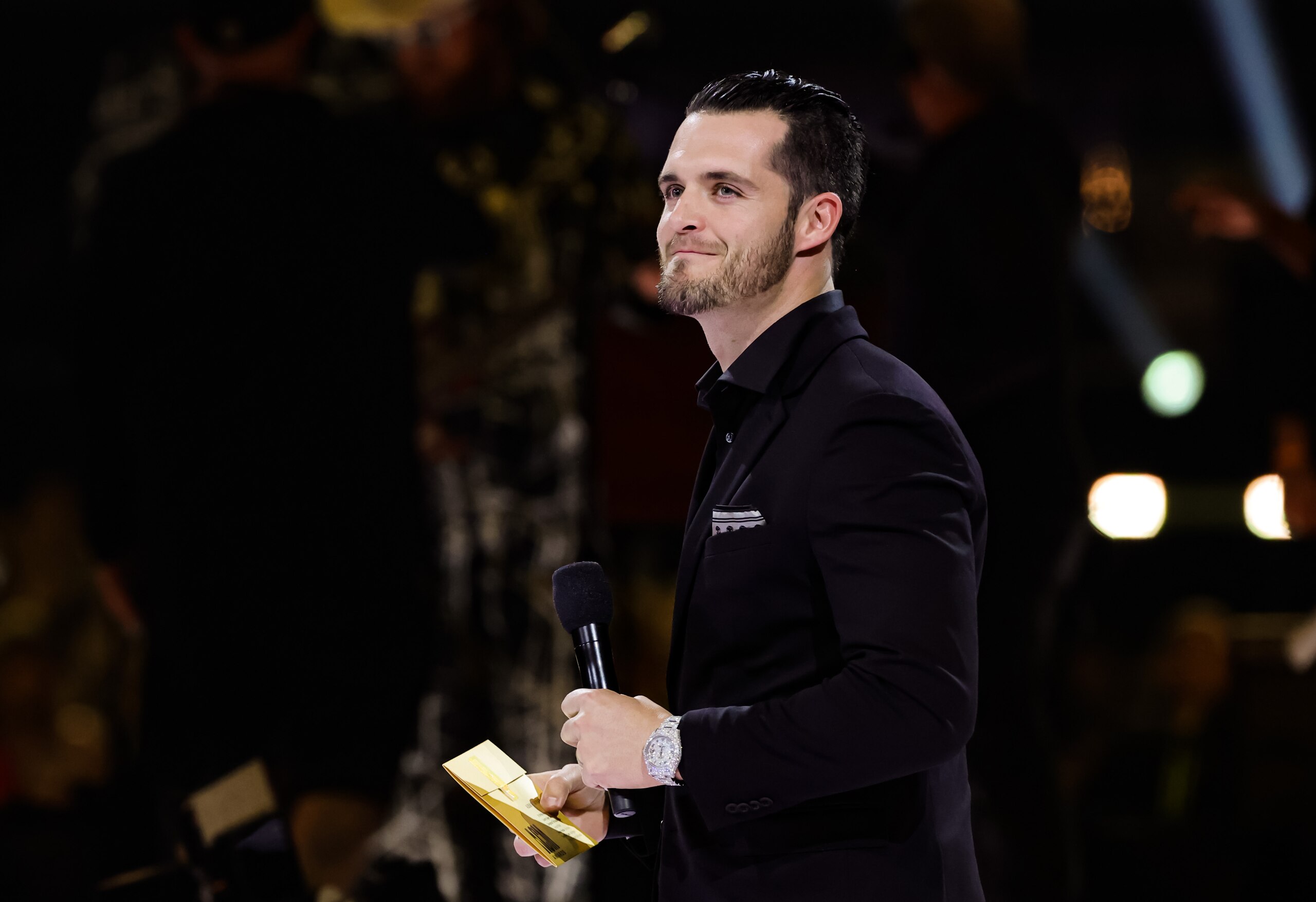 LAS VEGAS, NEVADA - MARCH 07: Derek Carr speaks onstage during the 57th Academy of Country Music Awards at Allegiant Stadium on March 07, 2022 in Las Vegas, Nevada. (Photo by Kevin Winter/Getty Images for ACM)