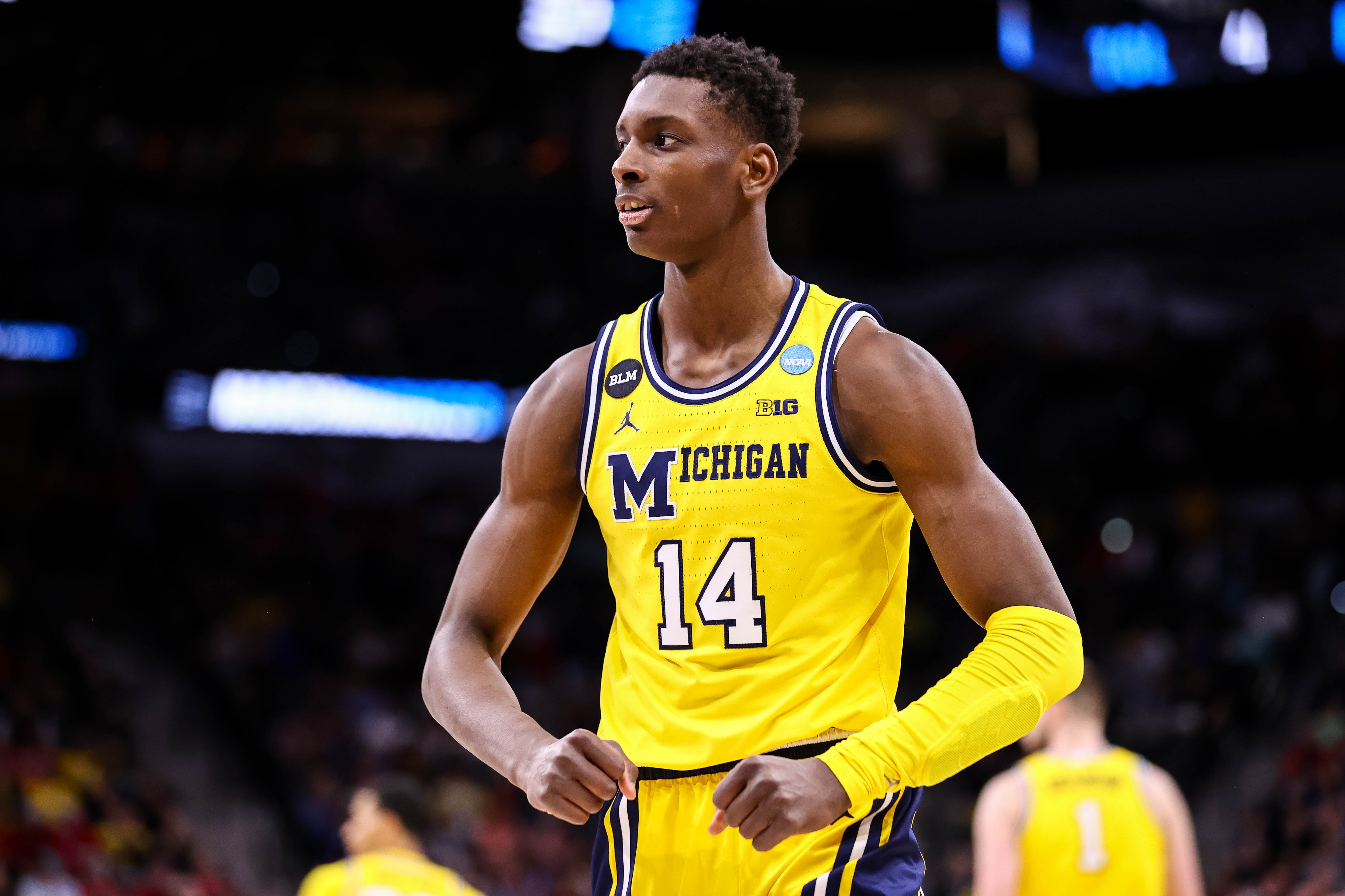 SAN ANTONIO, TX - MARCH 24: Moussa Diabate #14 of the Michigan Wolverines flexes in celebration during the Sweet 16 round of the 2022 NCAA Mens Basketball Tournament held at AT&T Center on March 24, 2022 in San Antonio, Texas. (Photo by C. Morgan Engel/NCAA Photos via Getty Images)