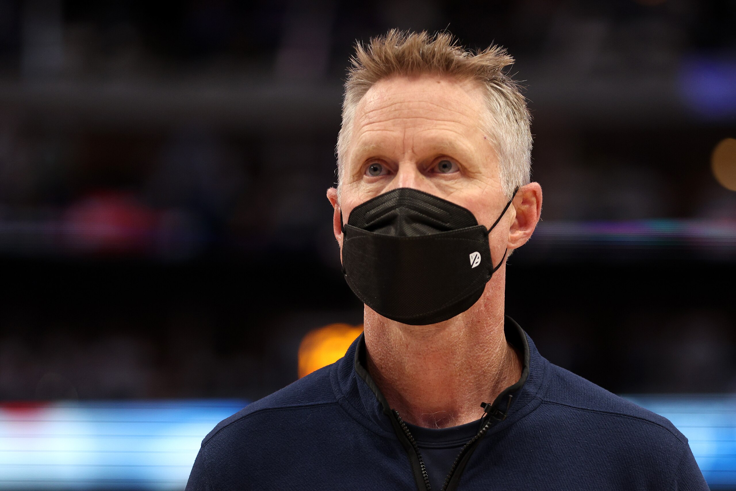 DALLAS, TEXAS - MAY 24: Head coach Steve Kerr of the Golden State Warriors stands during the national anthem prior to Game Four of the 2022 NBA Playoffs Western Conference Finals against the Dallas Mavericks at American Airlines Center on May 24, 2022 in Dallas, Texas. NOTE TO USER: User expressly acknowledges and agrees that, by downloading and or using this photograph, User is consenting to the terms and conditions of the Getty Images License Agreement. (Photo by Tom Pennington/Getty Images)