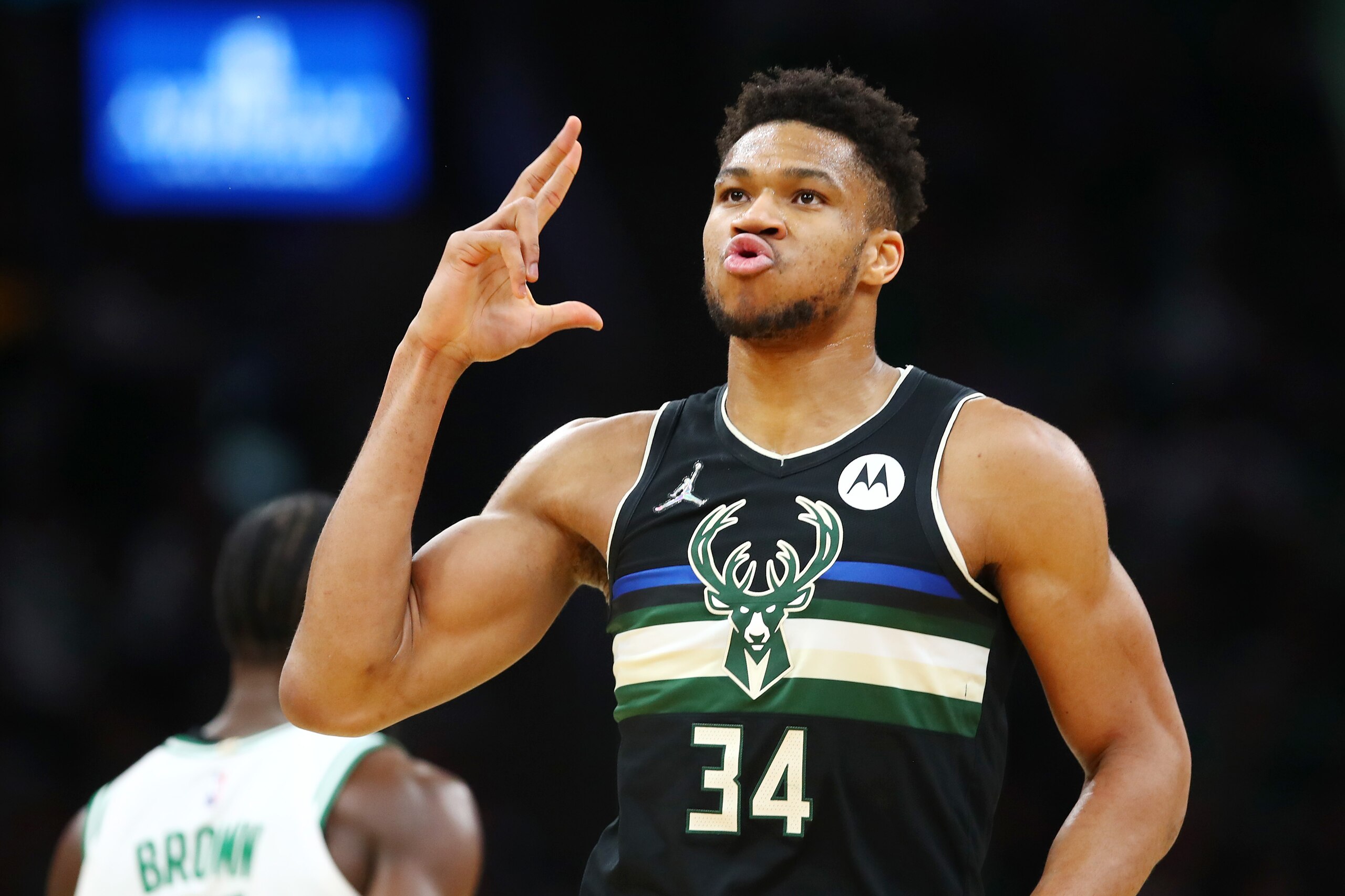 BOSTON, MASSACHUSETTS - MAY 15: Giannis Antetokounmpo #34 of the Milwaukee Bucks reacts after a three point basket during the first quarter against the Boston Celtics in Game Seven of the 2022 NBA Playoffs Eastern Conference Semifinals at TD Garden on May 15, 2022 in Boston, Massachusetts. NOTE TO USER: User expressly acknowledges and agrees that, by downloading and/or using this photograph, User is consenting to the terms and conditions of the Getty Images License Agreement. (Photo by Adam Glanzman/Getty Images)