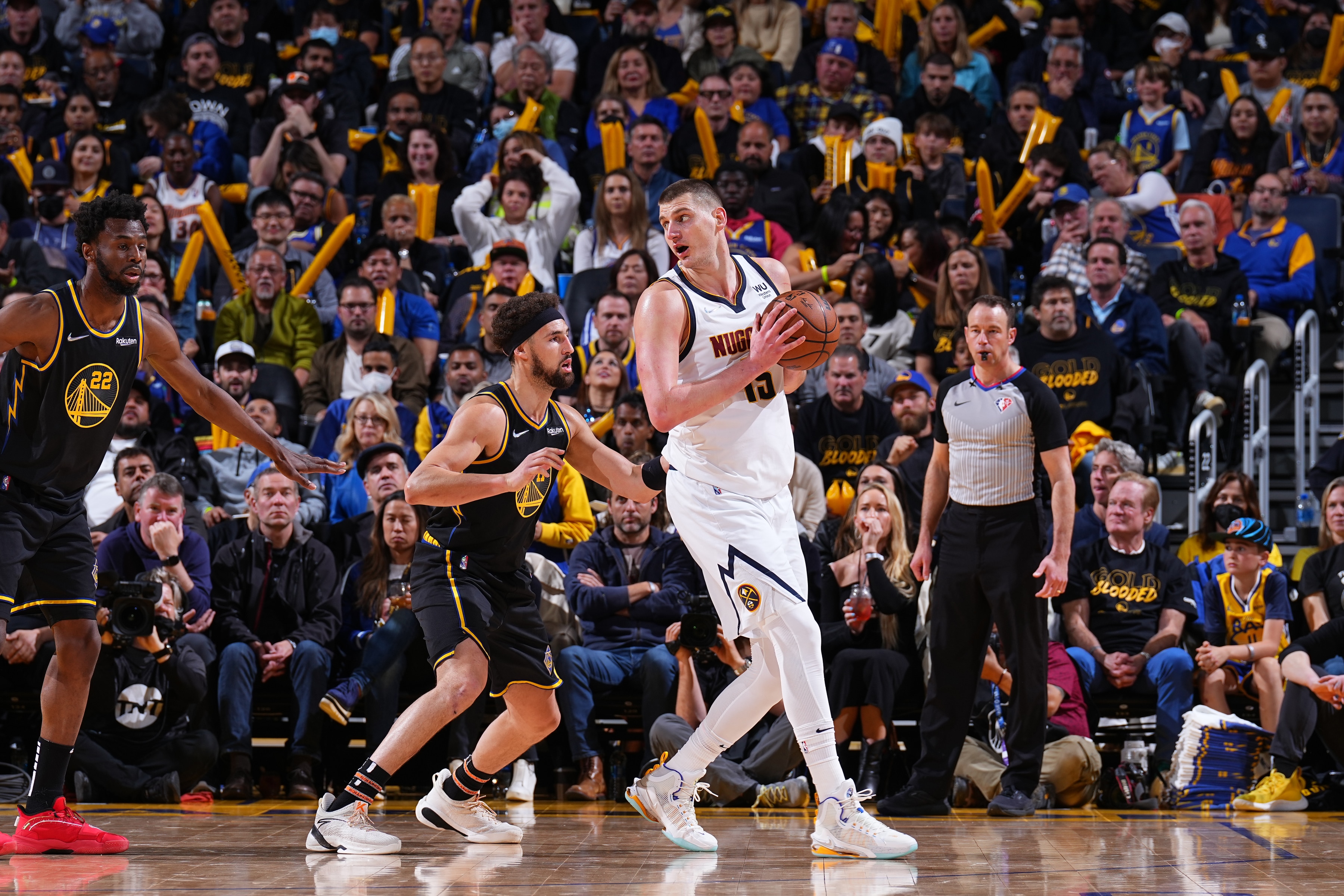 SAN FRANCISCO, CA - APRIL 27: Klay Thompson #11 of the Golden State Warriors plays defense on Nikola Jokic #15 of the Denver Nuggets during Round 1 Game 5 of the 2022 NBA Playoffs on April 27, 2022 at Chase Center in San Francisco, California. NOTE TO USER: User expressly acknowledges and agrees that, by downloading and or using this photograph, user is consenting to the terms and conditions of Getty Images License Agreement. Mandatory Copyright Notice: Copyright 2022 NBAE (Photo by Garrett Ellwood/NBAE via Getty Images)