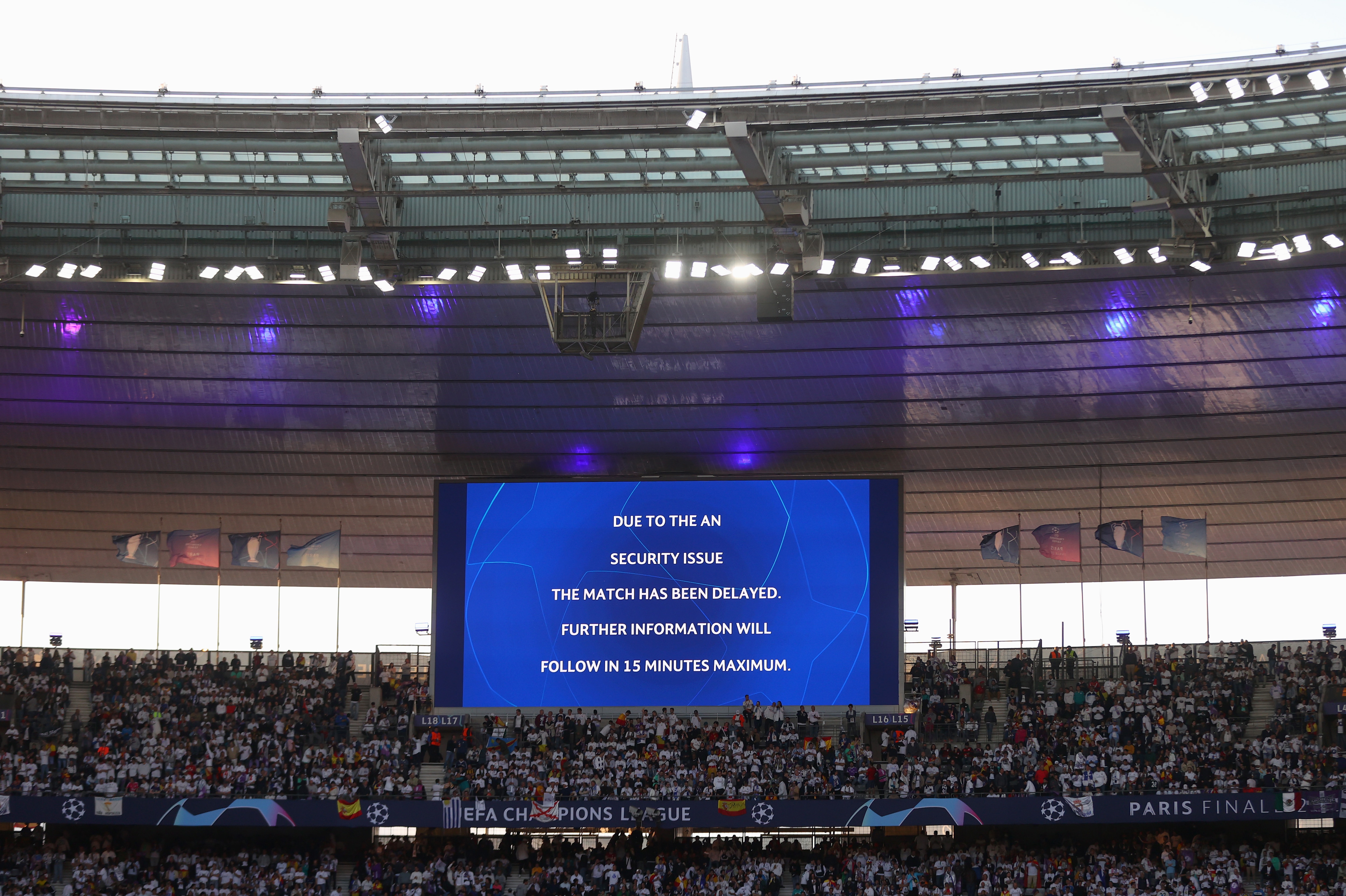 PARIS, FRANCE - MAY 28: The LED screen shows the message of a delayed kick off time prior to the UEFA Champions League final match between Liverpool FC and Real Madrid at Stade de France on May 28, 2022 in Paris, France. (Photo by Catherine Ivill/Getty Images)